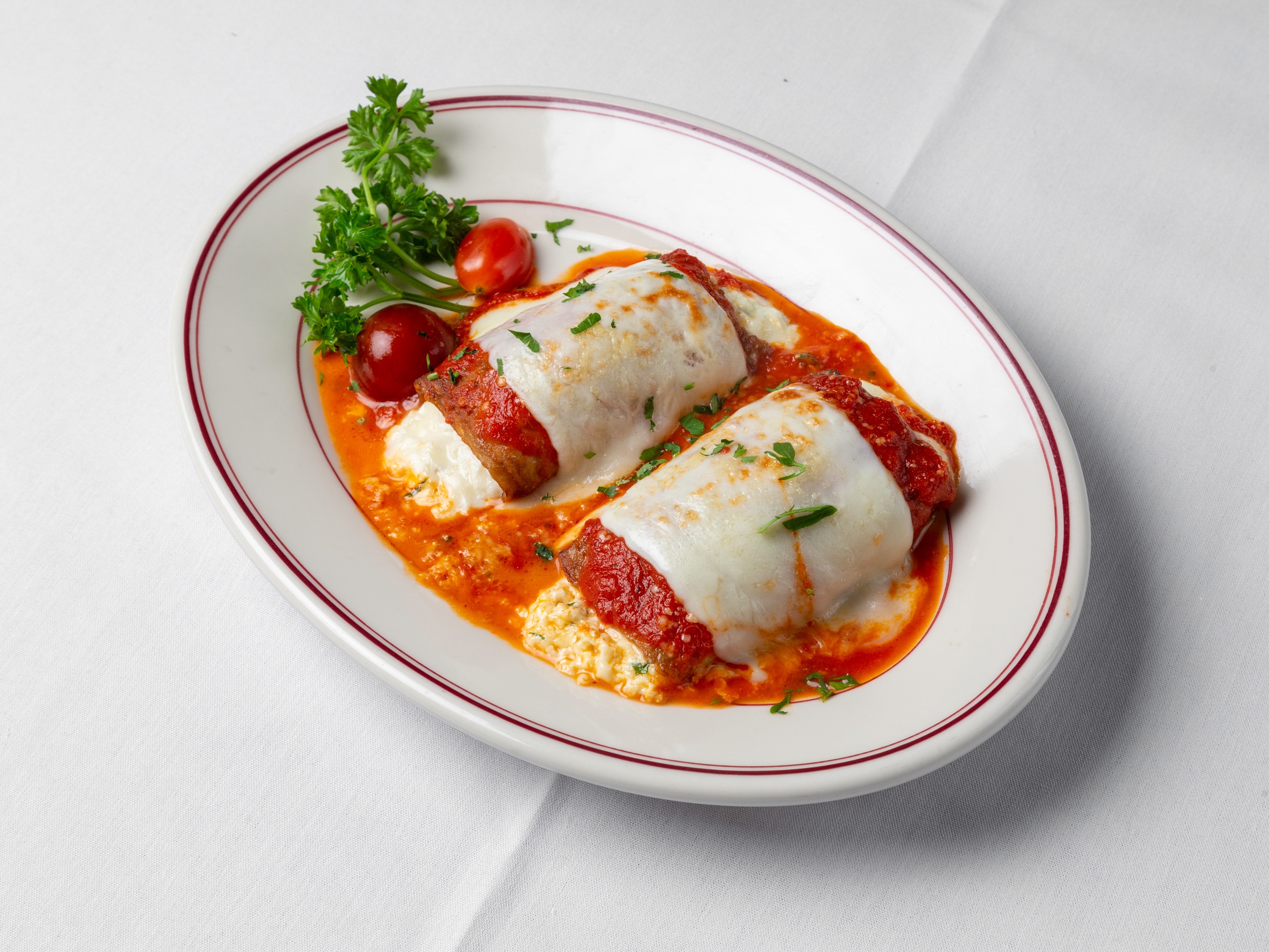 Order Eggplant Rollatini food online from Louie's Italian Restaurant and Bar store, Greenwich on bringmethat.com