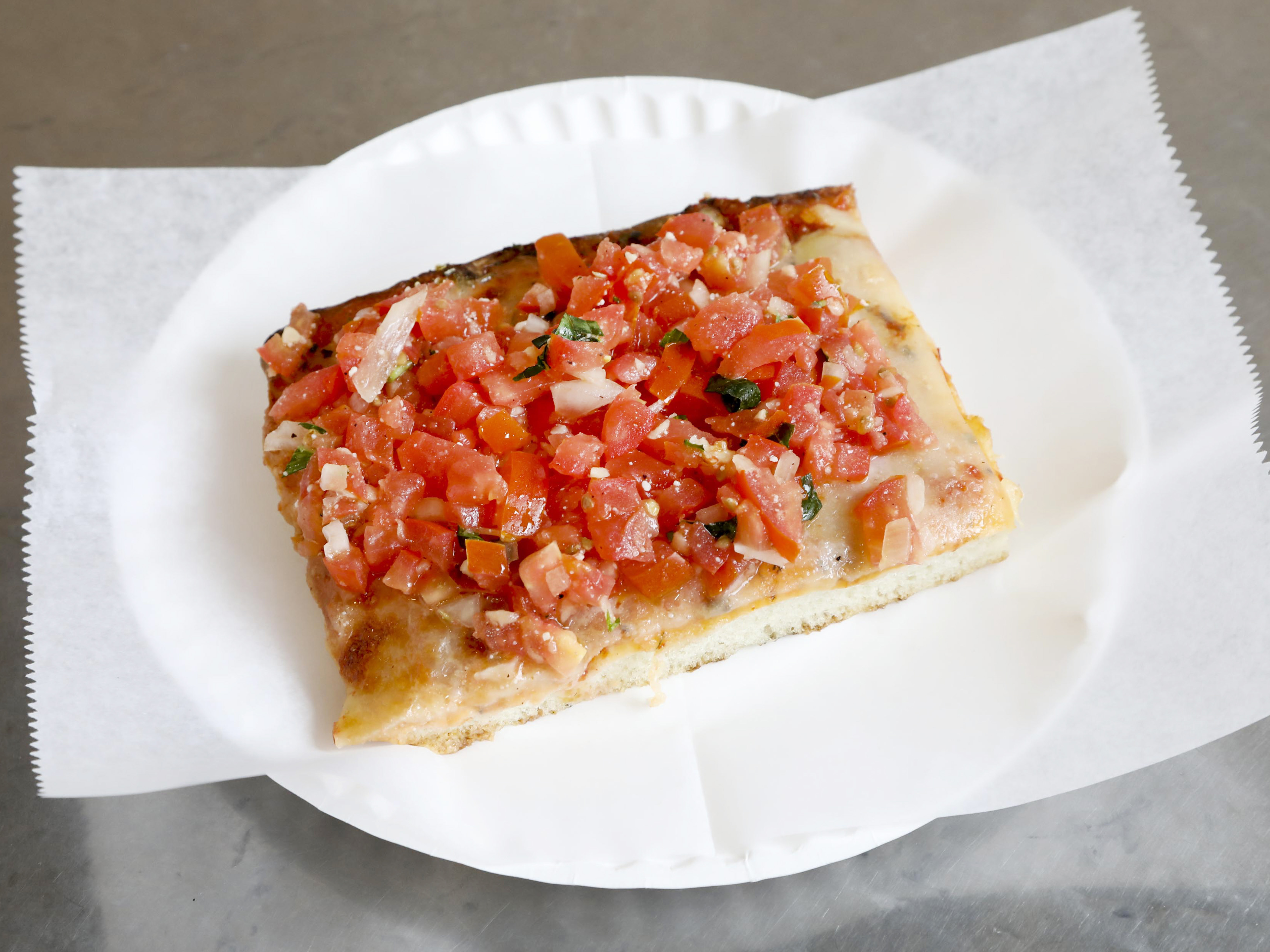 Order Bruschetta Slice food online from Not Ray's Pizza store, Brooklyn on bringmethat.com