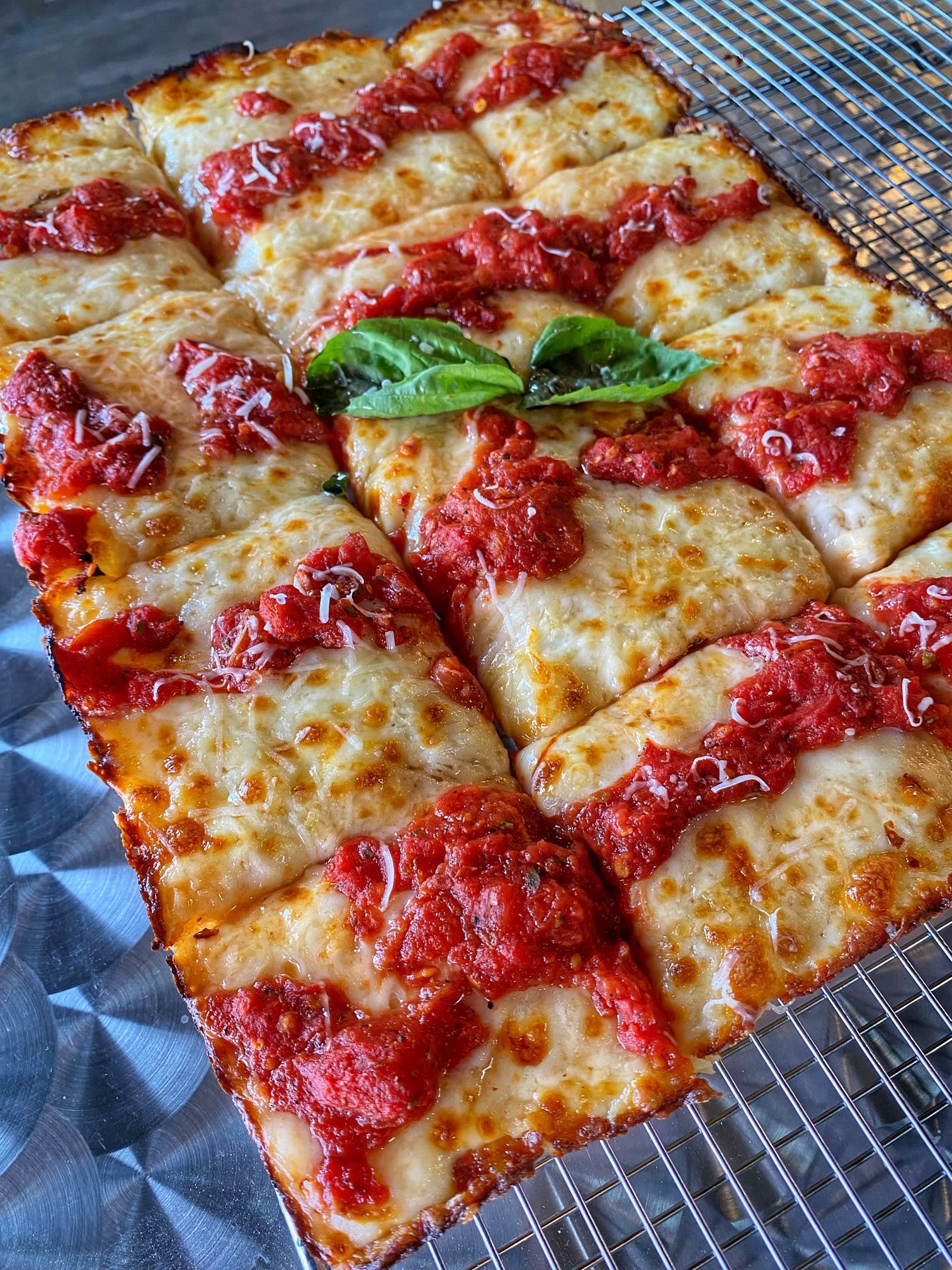 Order 1) Mozzarella Drip Pan Pizza - 14" x 12" (12 Slices) food online from Twisted Pizza store, Las Vegas on bringmethat.com