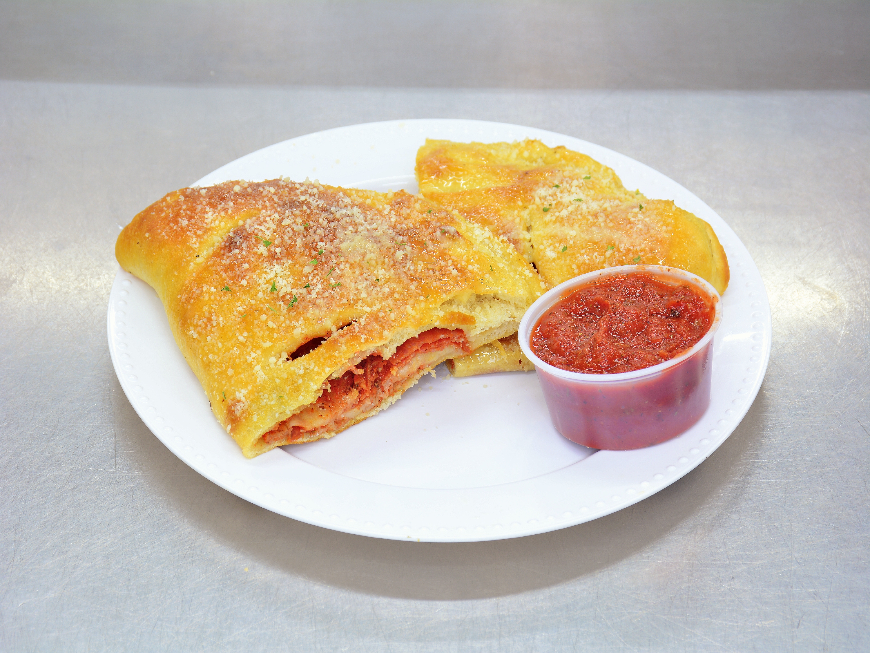 Order Cheese Calzone food online from Ultimate Pizza store, Howell on bringmethat.com