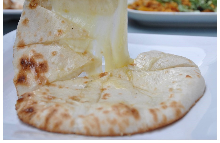 Order Cheese Naan food online from Star India store, San Francisco on bringmethat.com
