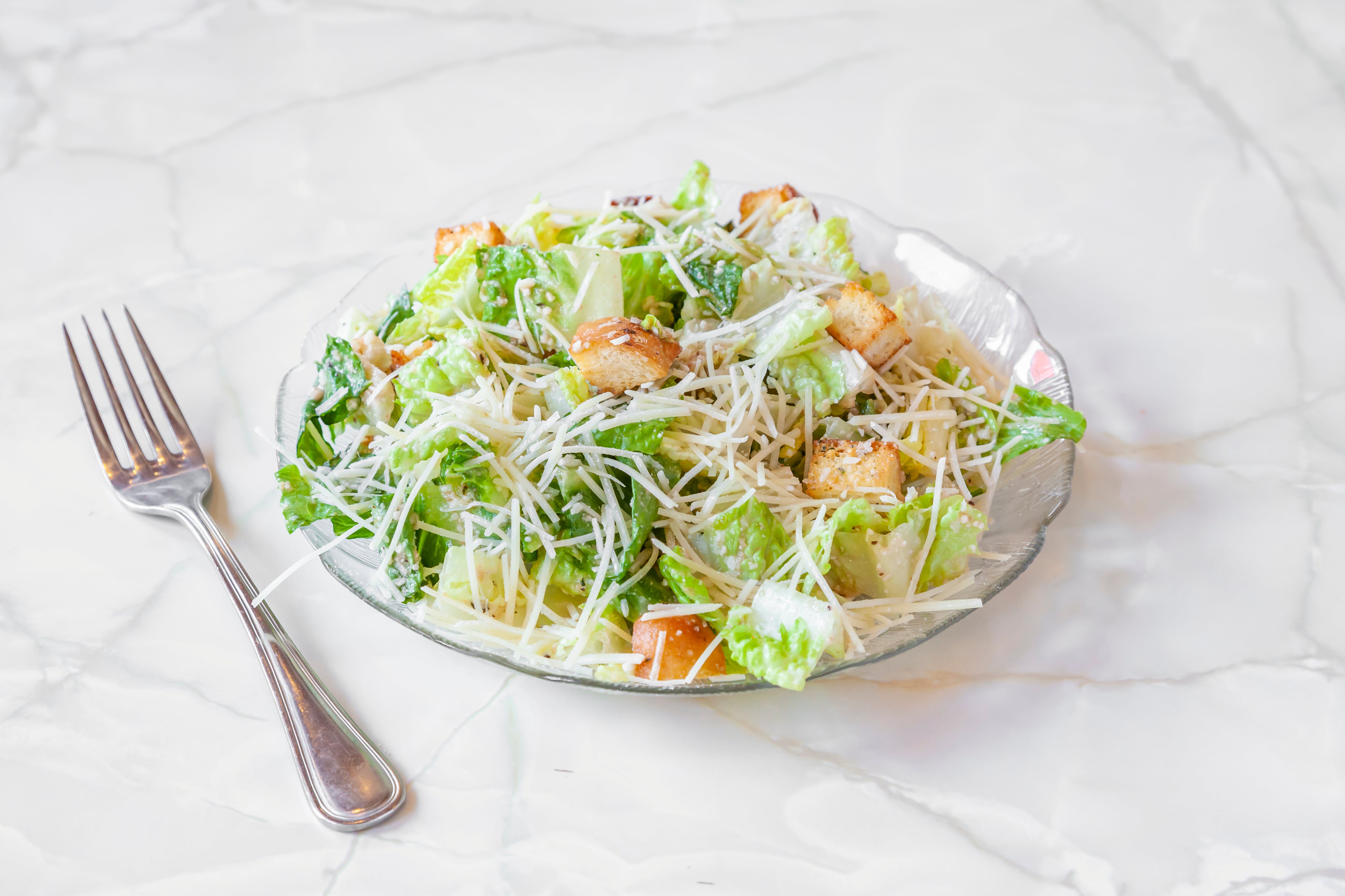 Order Homemade Caesar Salad - Small food online from Olympia Pizza & Spaghetti House store, Seattle on bringmethat.com