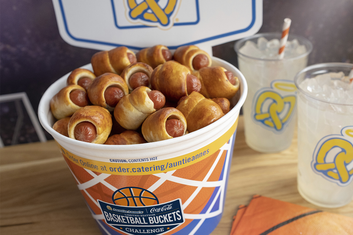 Order Mini Dogs Free Throw Bucket food online from Auntie Anne's store, Kansas City on bringmethat.com