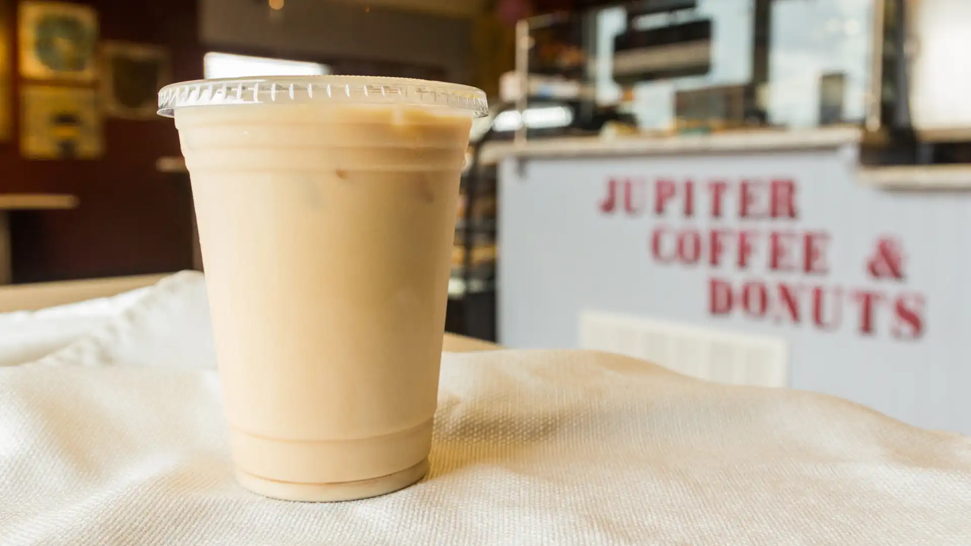 Order Iced Latte food online from Jupiter Coffee & Donuts store, Fairfield on bringmethat.com