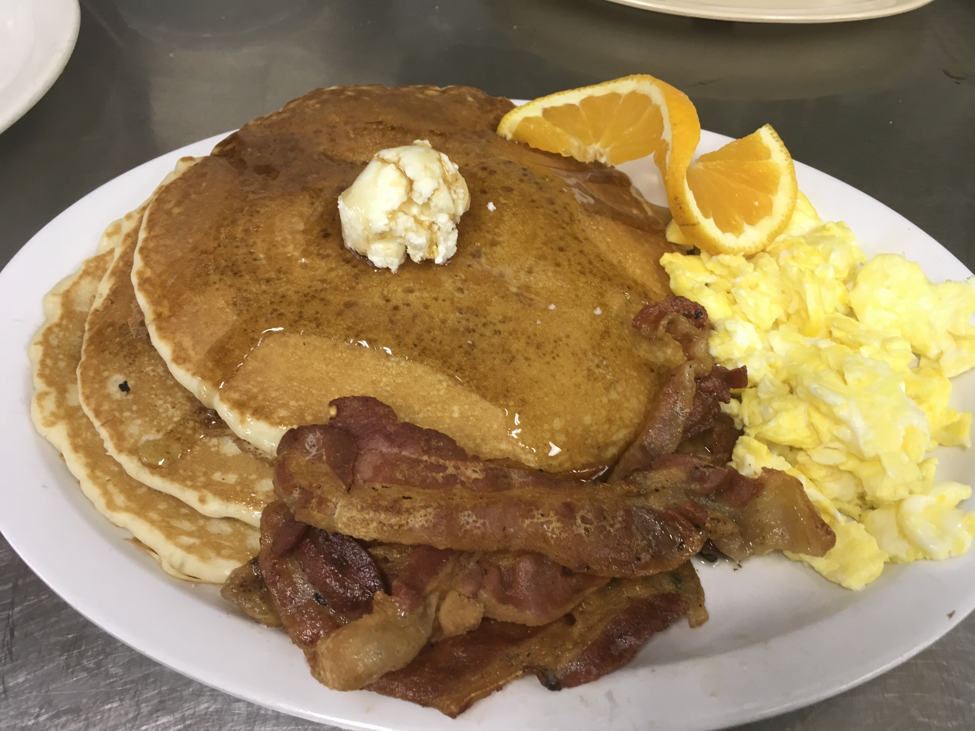 Order 2 Pancakes 2 Eggs with 2 Bacon food online from Jim's Burgers #2 store, Wilmington on bringmethat.com