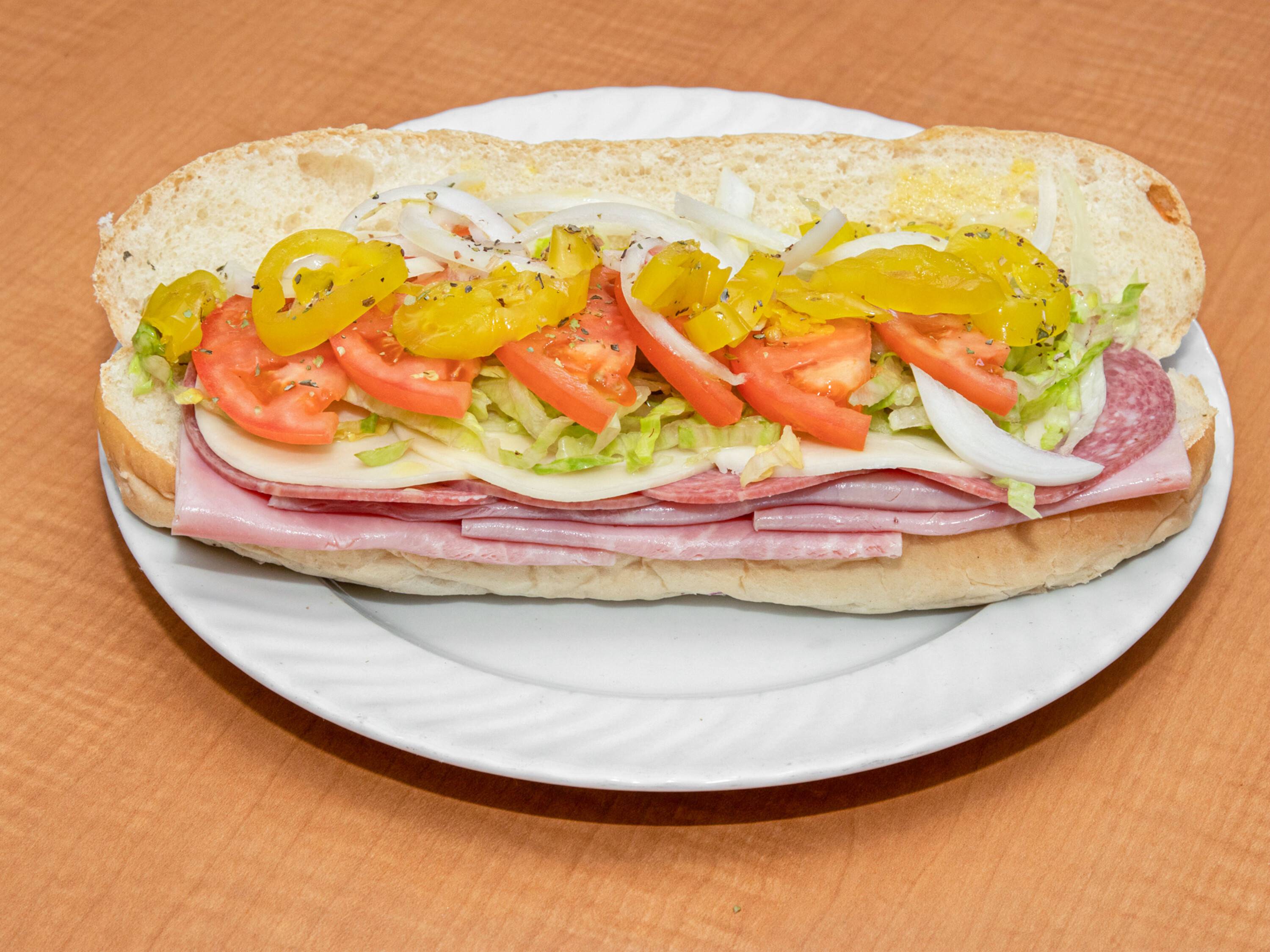 Order Italian Sub food online from Jimmy Grill & Pizzeria store, Prince George on bringmethat.com