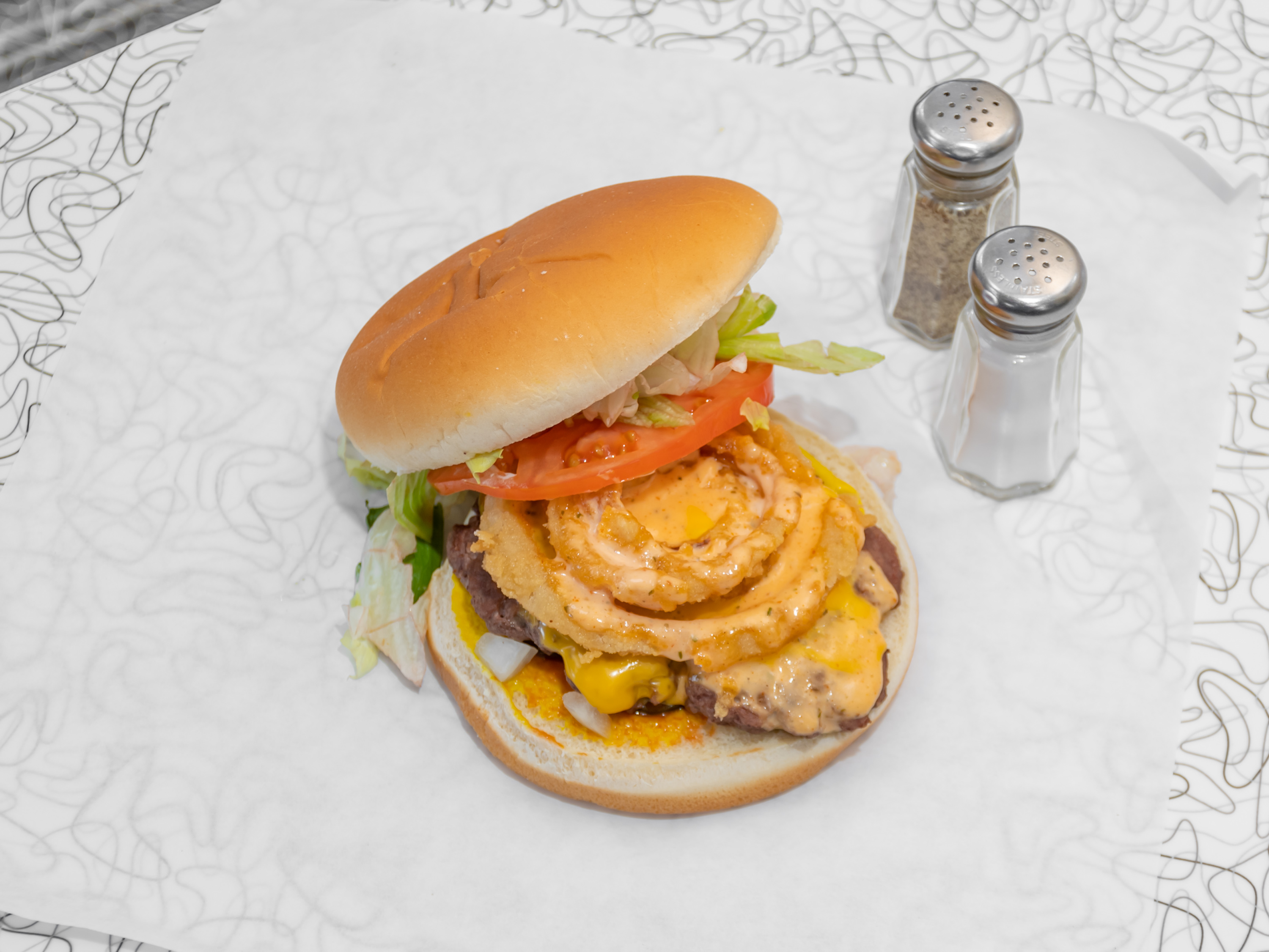 Order Jack Burger food online from Smittys Tenderloins store, Des Moines on bringmethat.com
