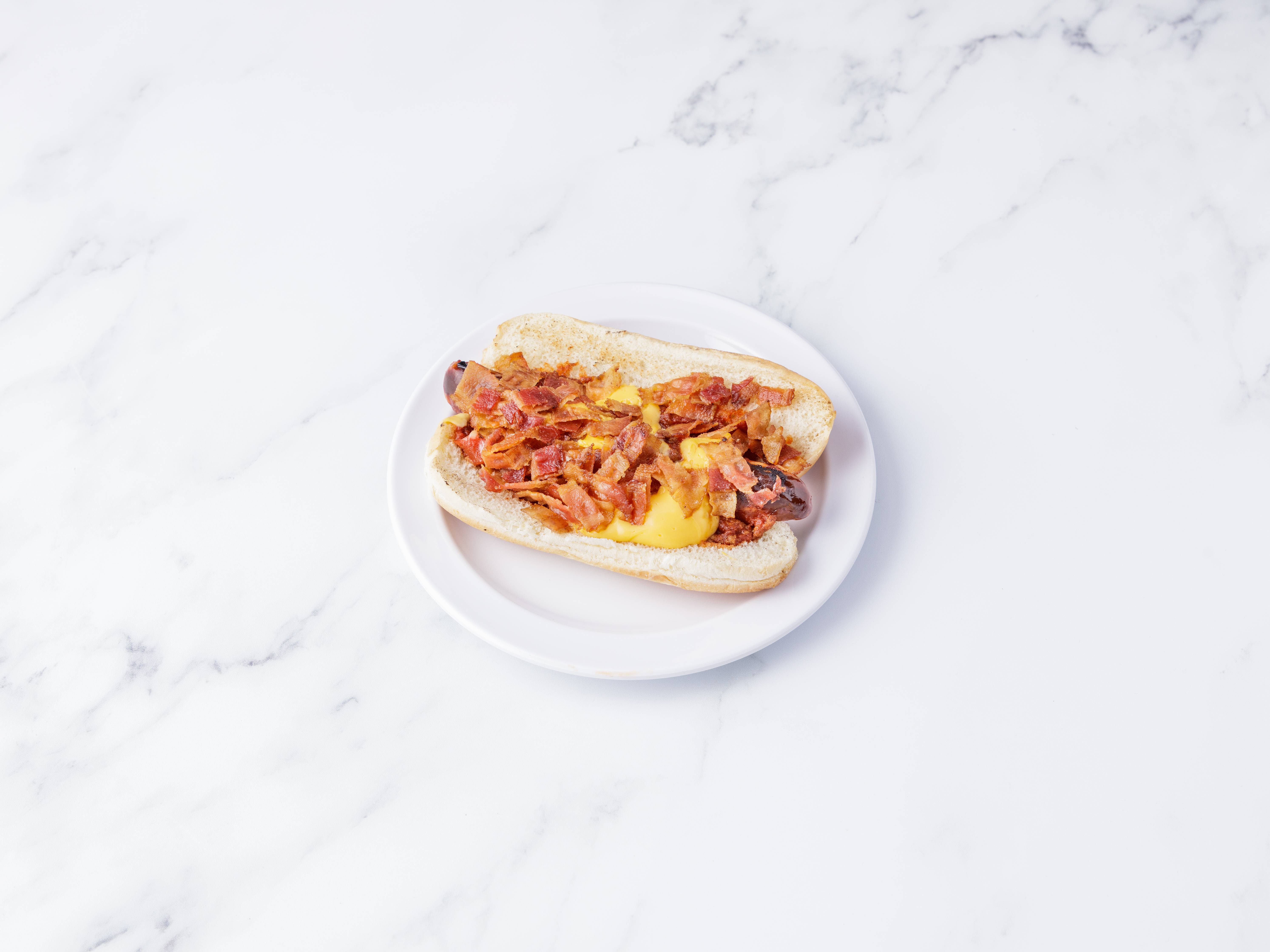 Order Bacon Chili Cheese Dog food online from Goal Tenders Food And Beverage store, Syracuse on bringmethat.com