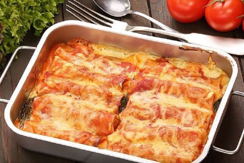Order Cheese Manicotti - Dinner food online from Villa Pizza store, Grand Rapids on bringmethat.com