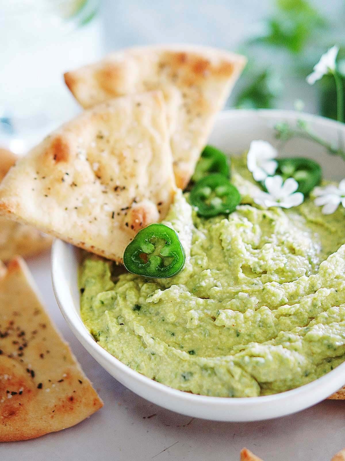 Order Side Cilantro and Jalapeno Hummus food online from Kimo Kitchen store, Rockaway Beach on bringmethat.com
