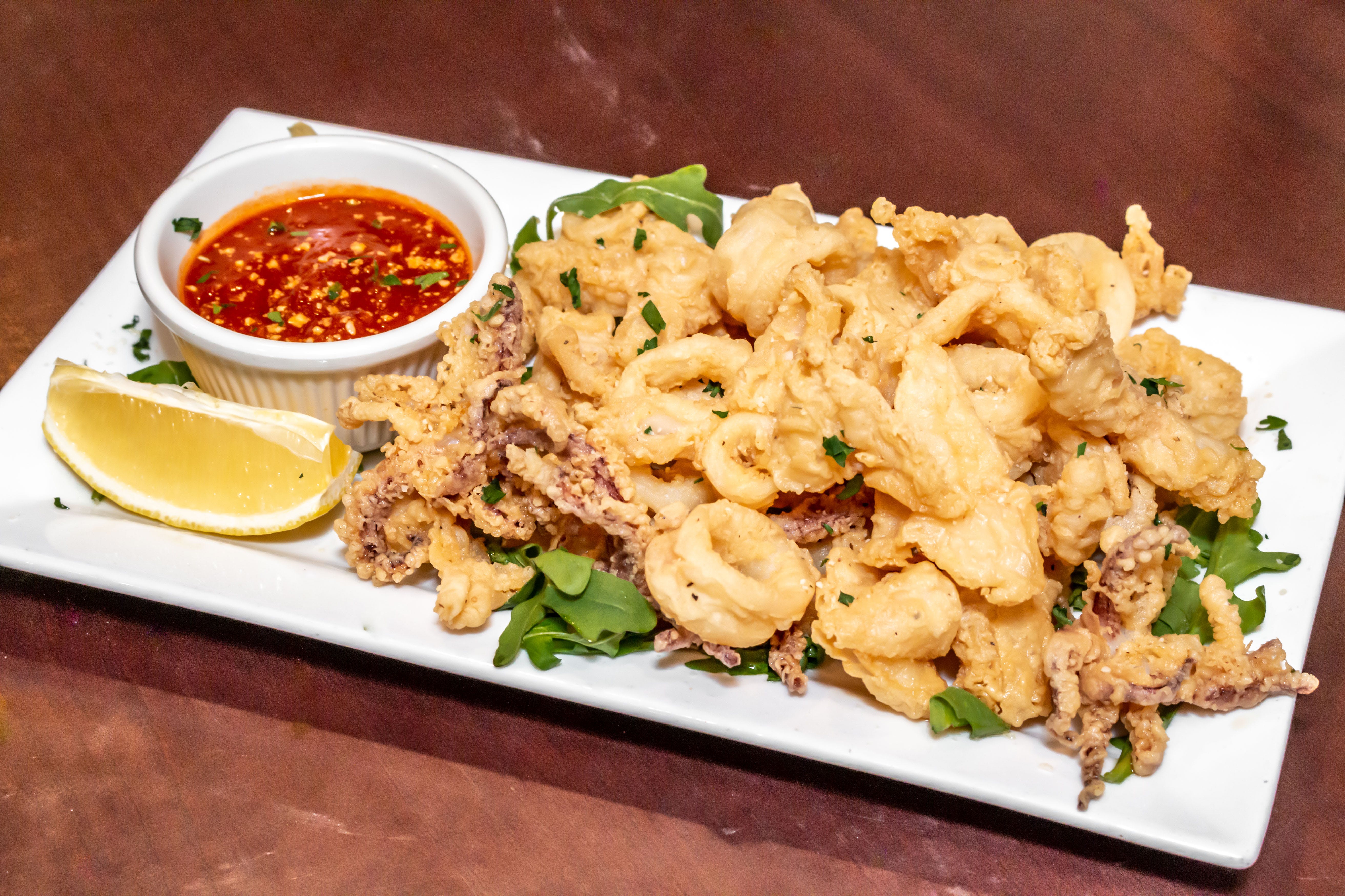 Order Fried Calamari - Appetizer food online from Mamma Maria's Pizzeria and Ristorantes store, Bensenville on bringmethat.com