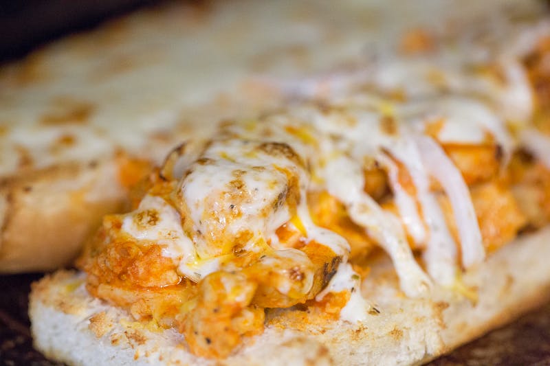 Order Buffalo Chicken Grinder - Half food online from Mancino Pizza & Grinders store, Fort Wayne on bringmethat.com