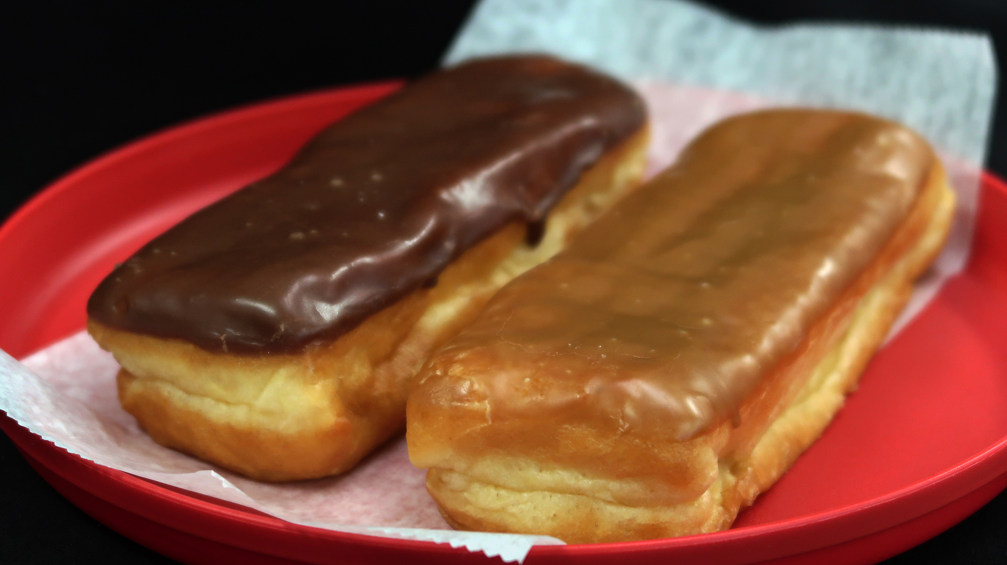 Order Chocolate Topped Eclair food online from Bedford Hello Donuts store, Bedford on bringmethat.com