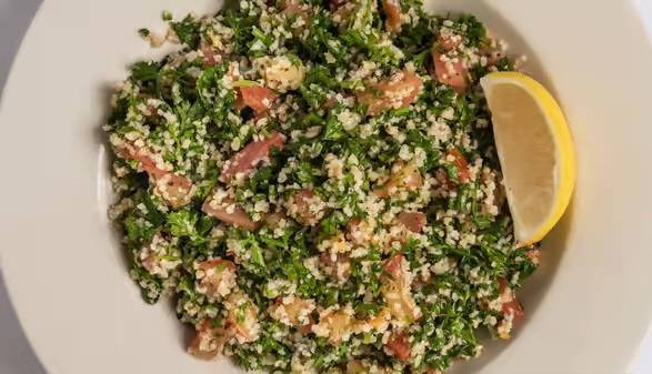 Order Tabbouleh Salad food online from Albasha Greek & Lebanese Café store, Covington on bringmethat.com