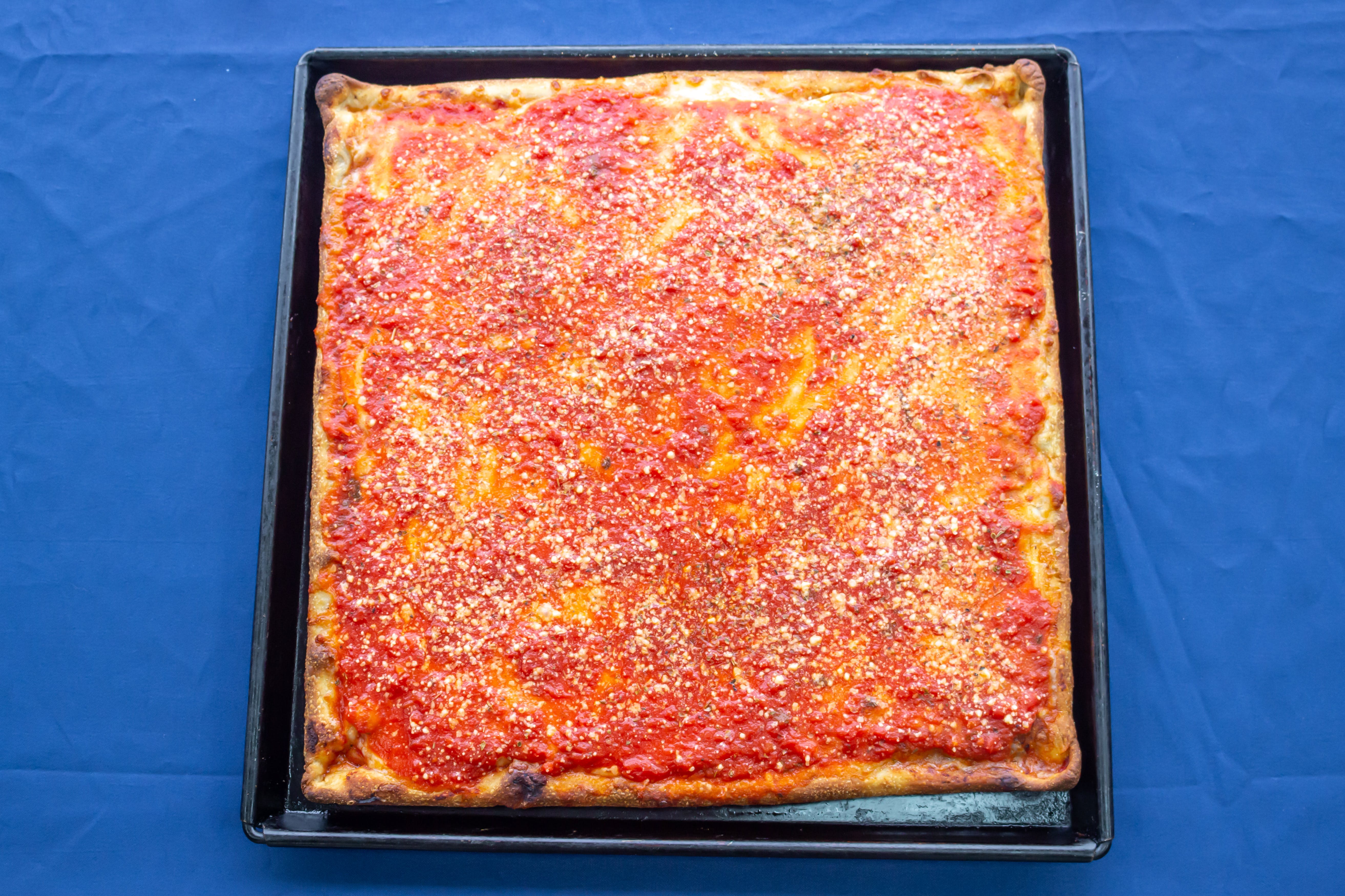 Order Upside Down Sicilian Pizza - 9 Slices food online from Biby's Empanadas & Pizza store, Fair Lawn on bringmethat.com