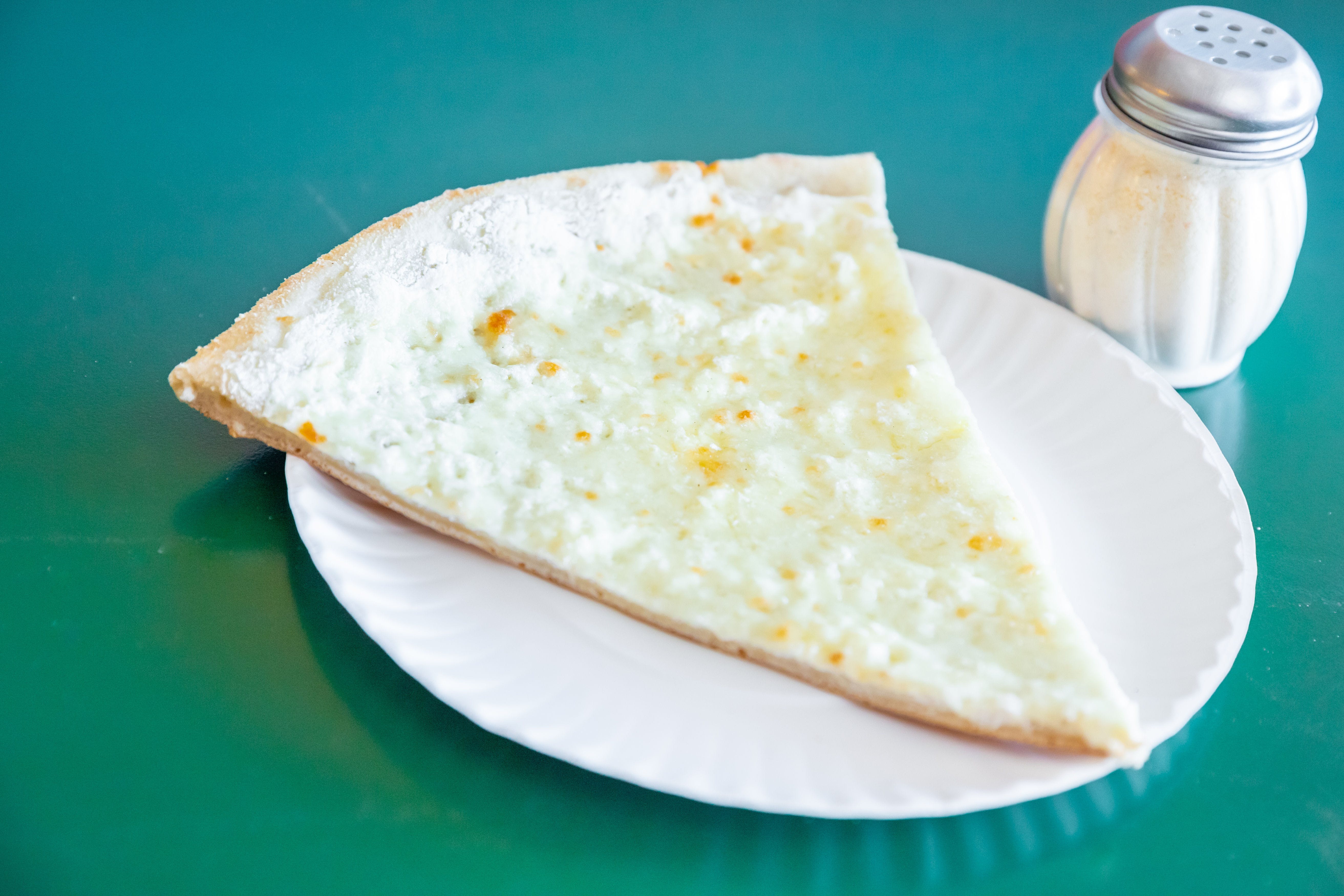Order White Pizza Slice - Slice food online from Uncle Sal's Italian Villa store, Budd Lake on bringmethat.com