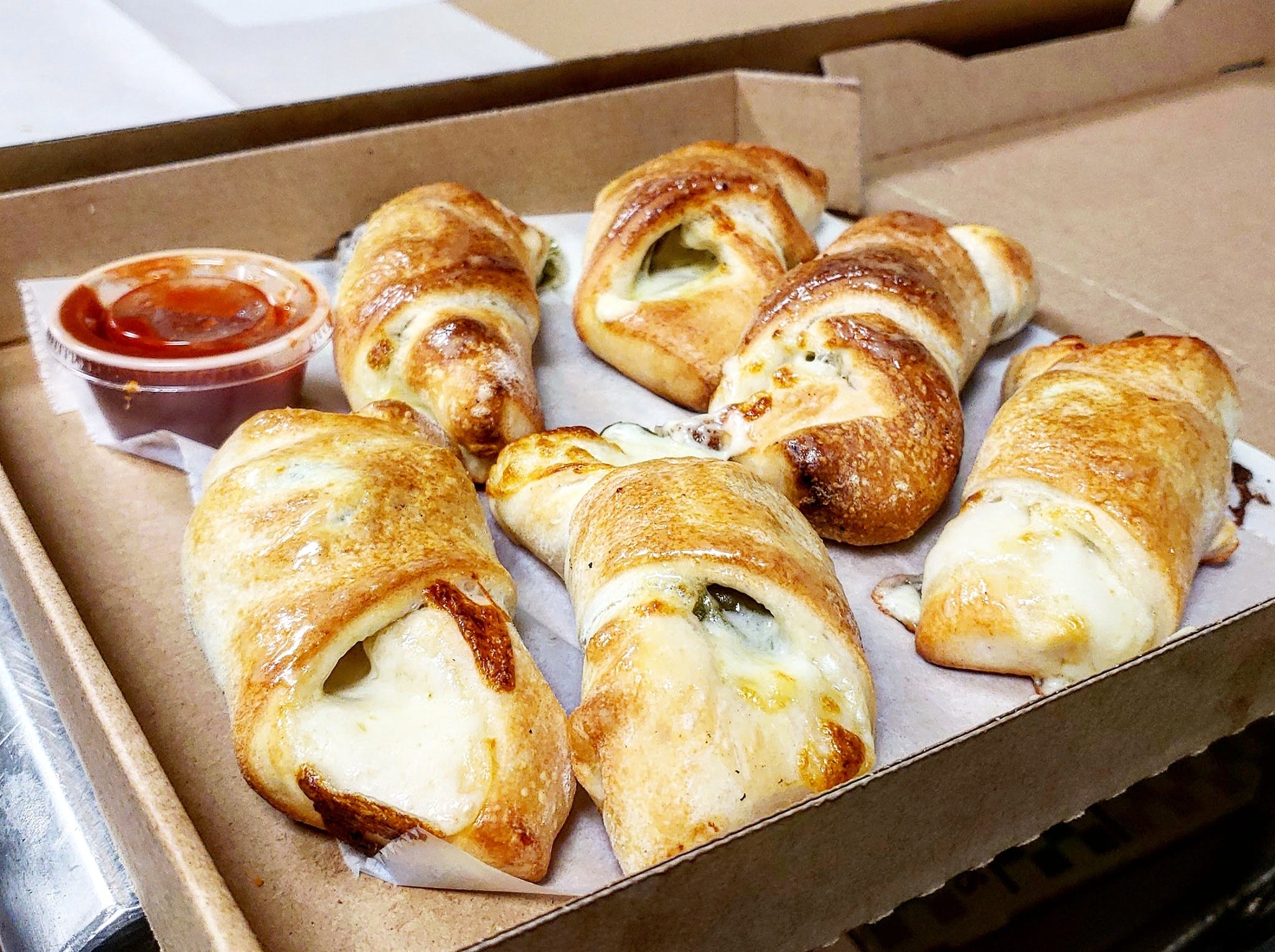 Order Pepperoni Twists - 6 Pieces food online from New York Pizza store, Hartwell on bringmethat.com