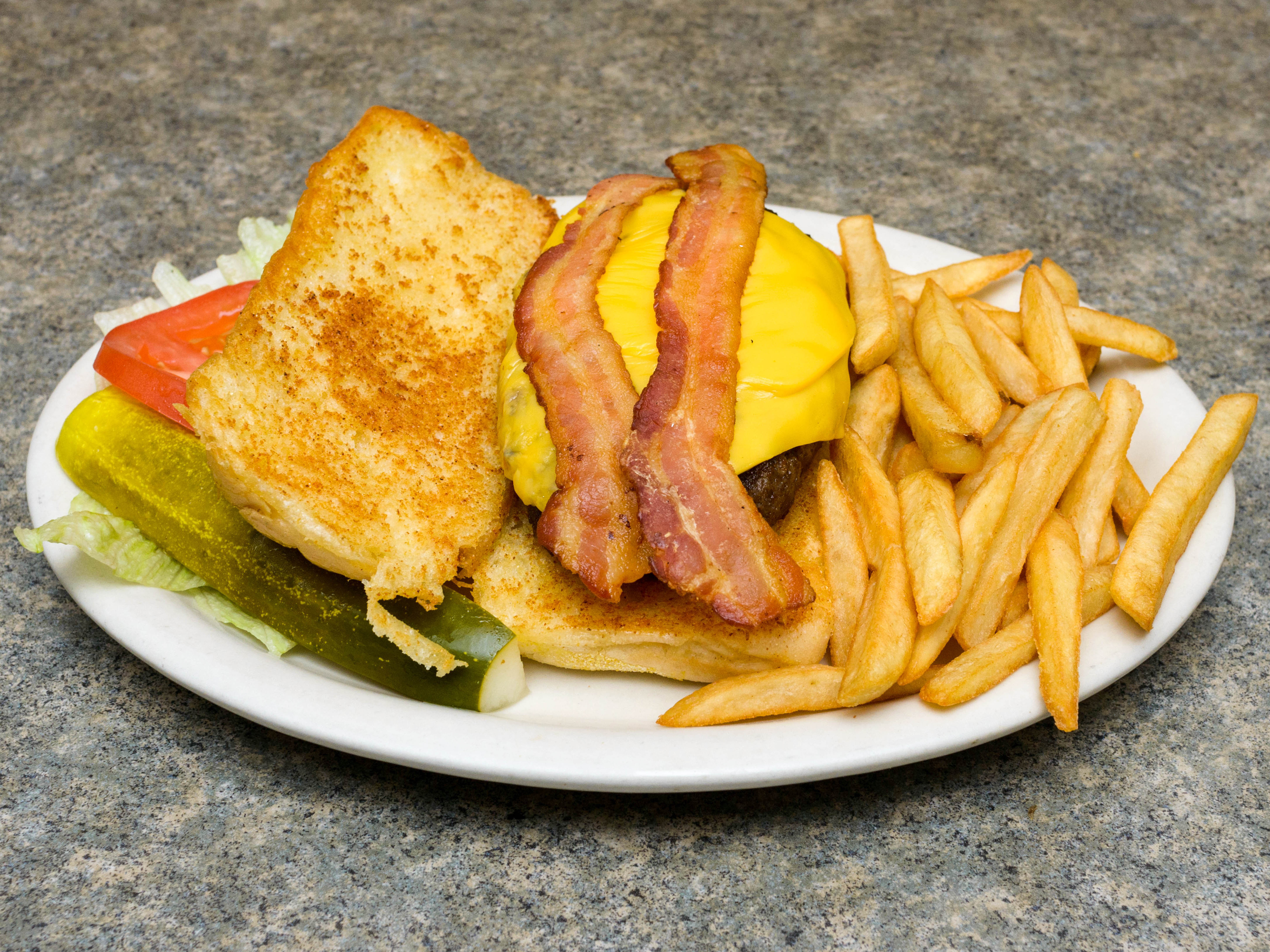 Order Belly Buster Burger with fries food online from Al And Andy store, Schiller Park on bringmethat.com