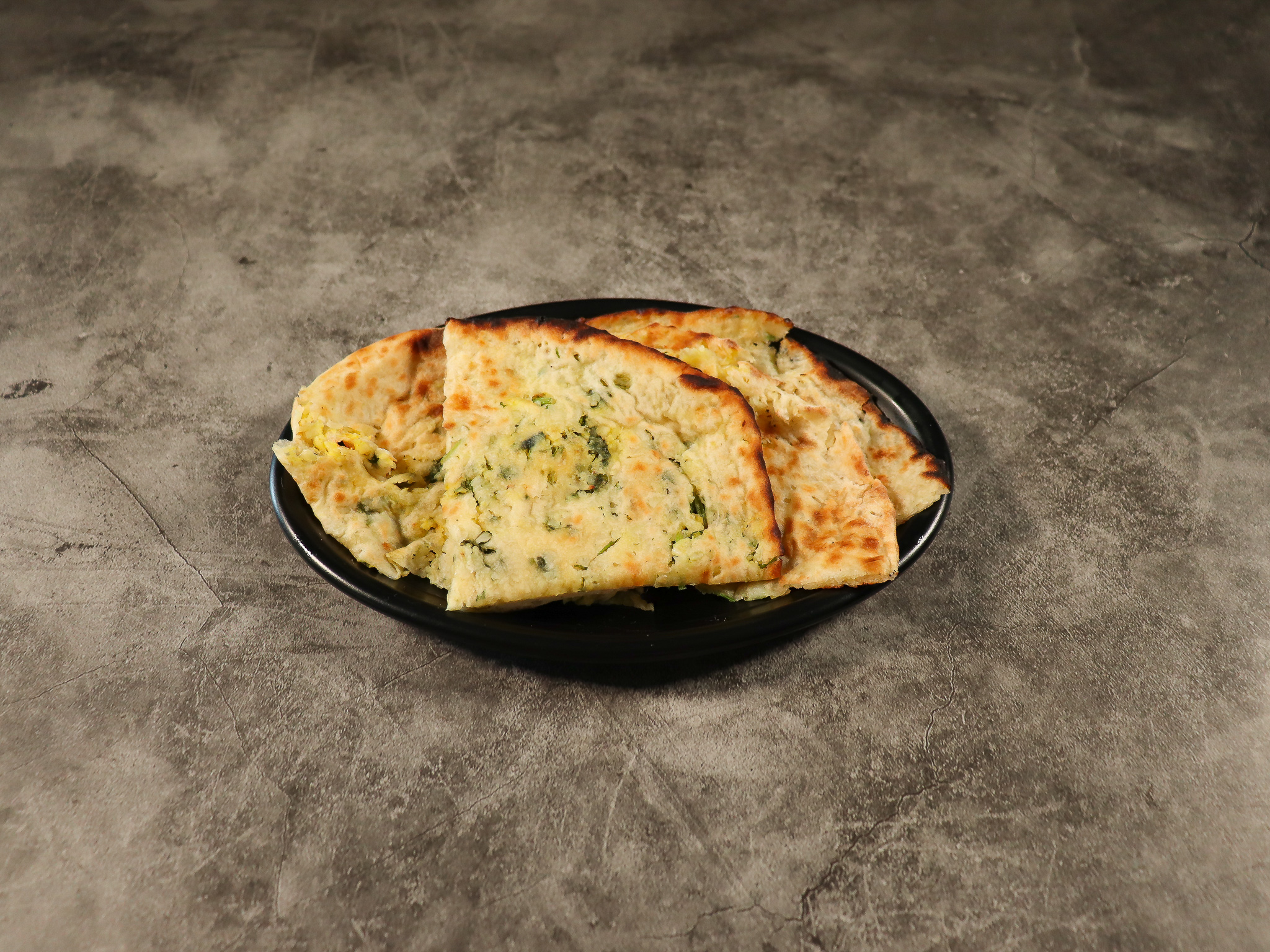 Order Garlic Naan food online from Star of India store, Kenilworth on bringmethat.com