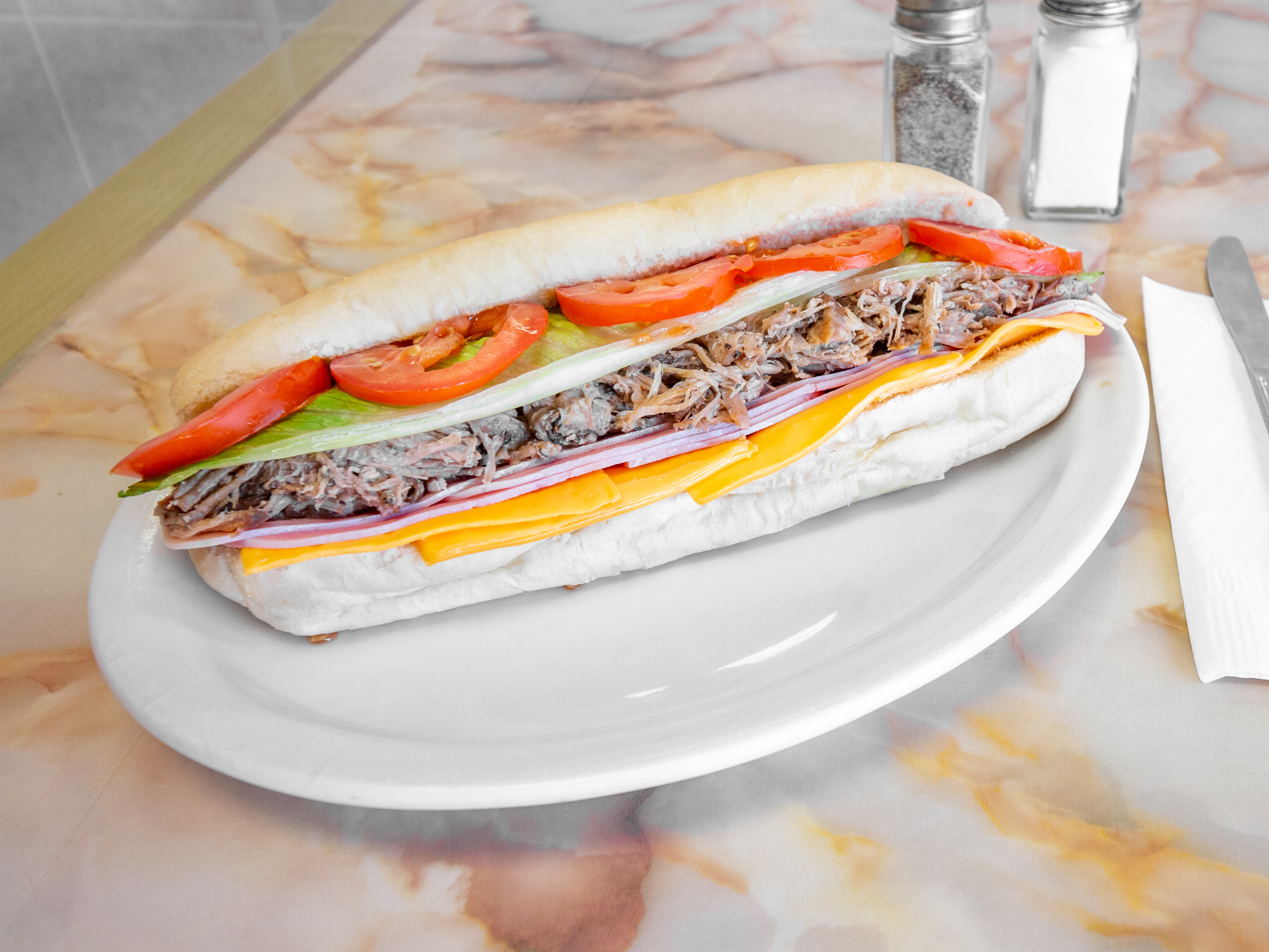 Order Cubano Sandwich food online from El Barajo Restaurant store, Utica on bringmethat.com