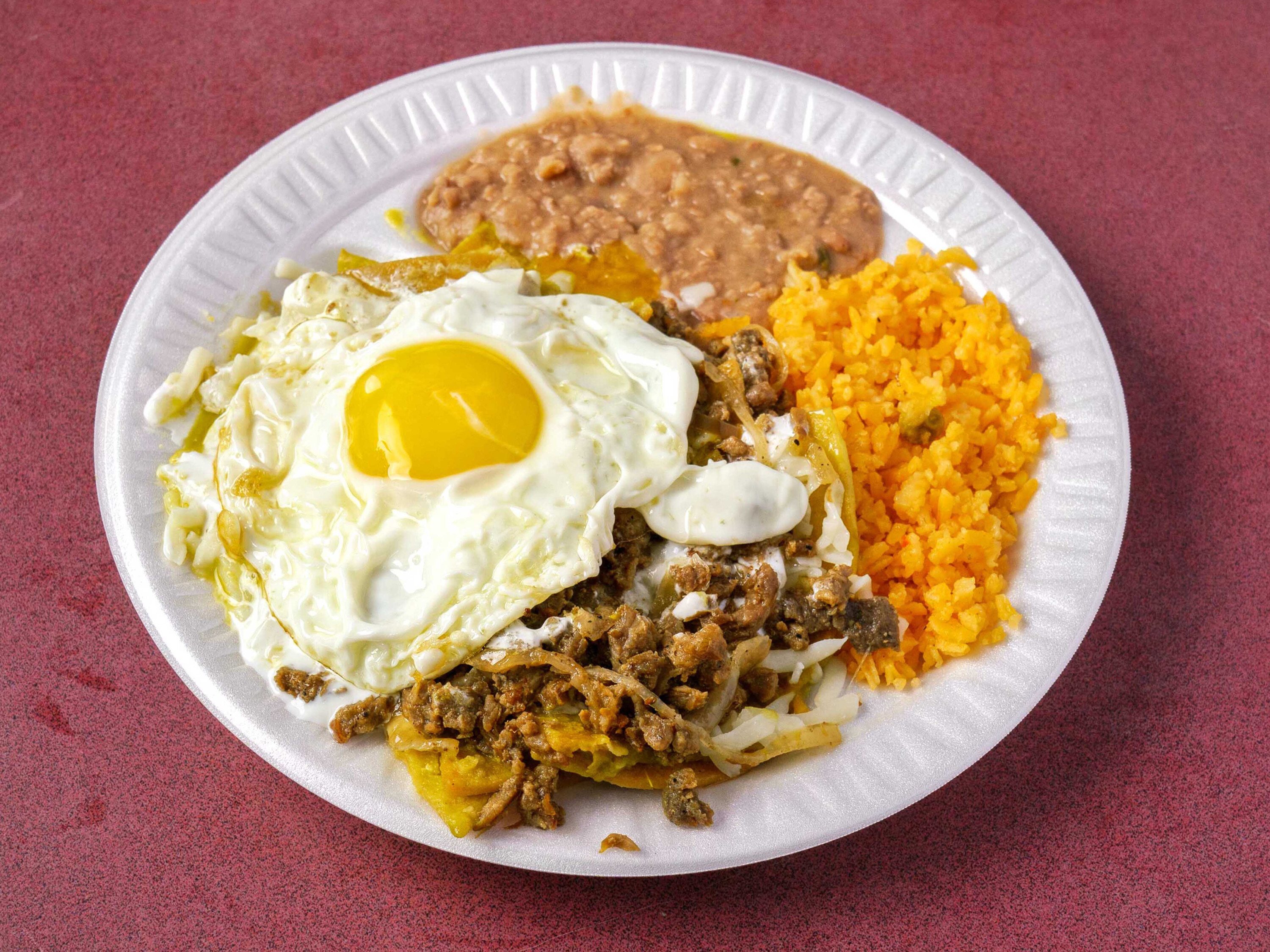 Order Chilaquiles con Huevo and Carne food online from Taqueria Diana store, Garland on bringmethat.com