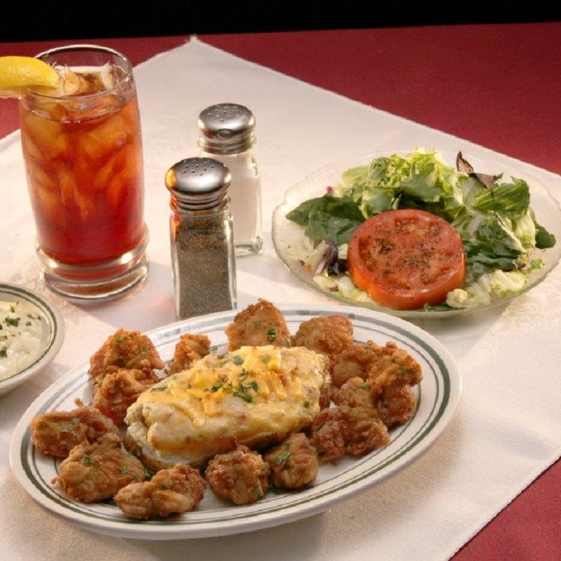 Order Fried Oysters food online from Poorboy's Riverside Inn store, Broussard on bringmethat.com
