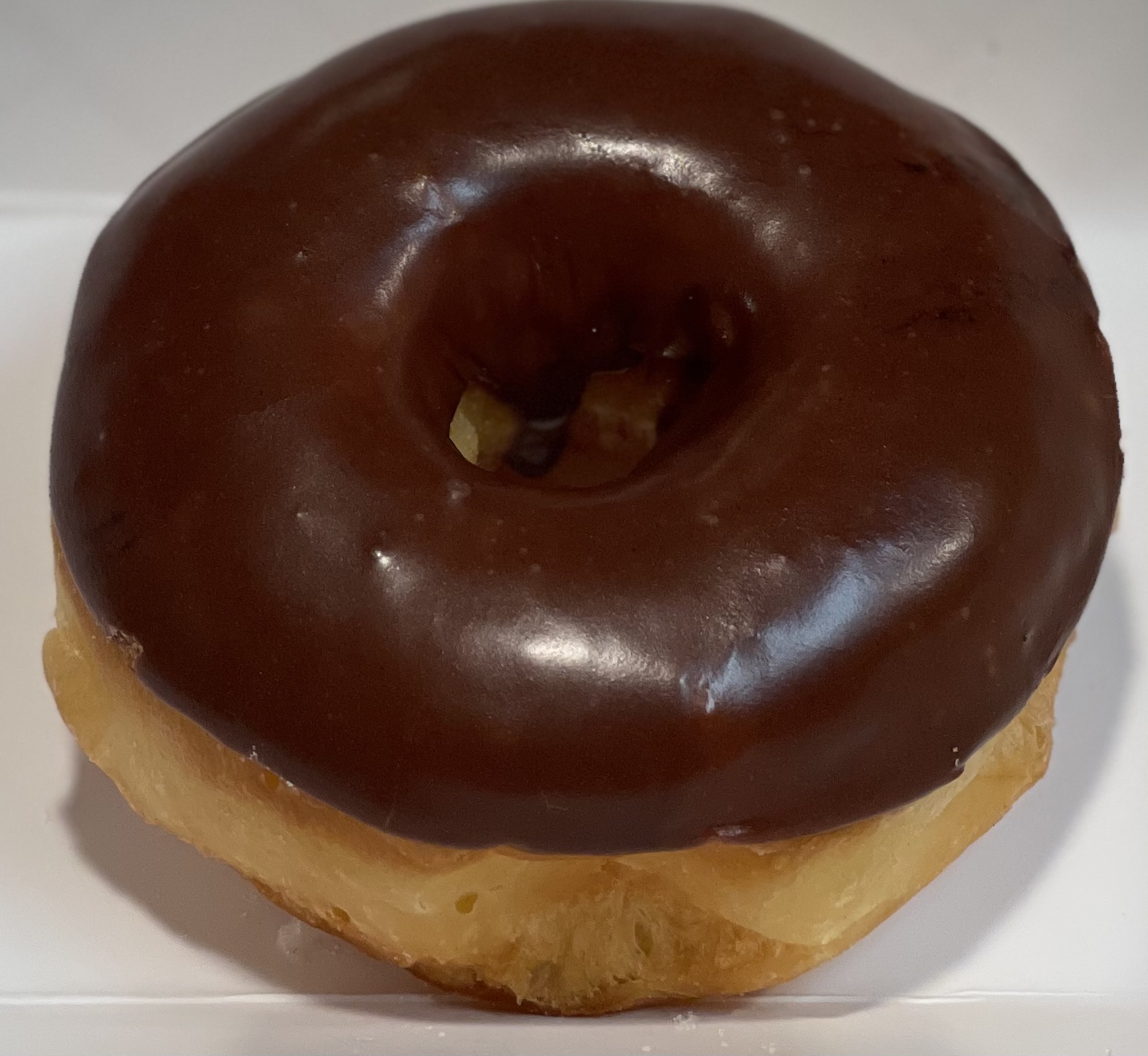 Order Raised Chocolate Donut food online from Glaze Donuts store, Ceres on bringmethat.com