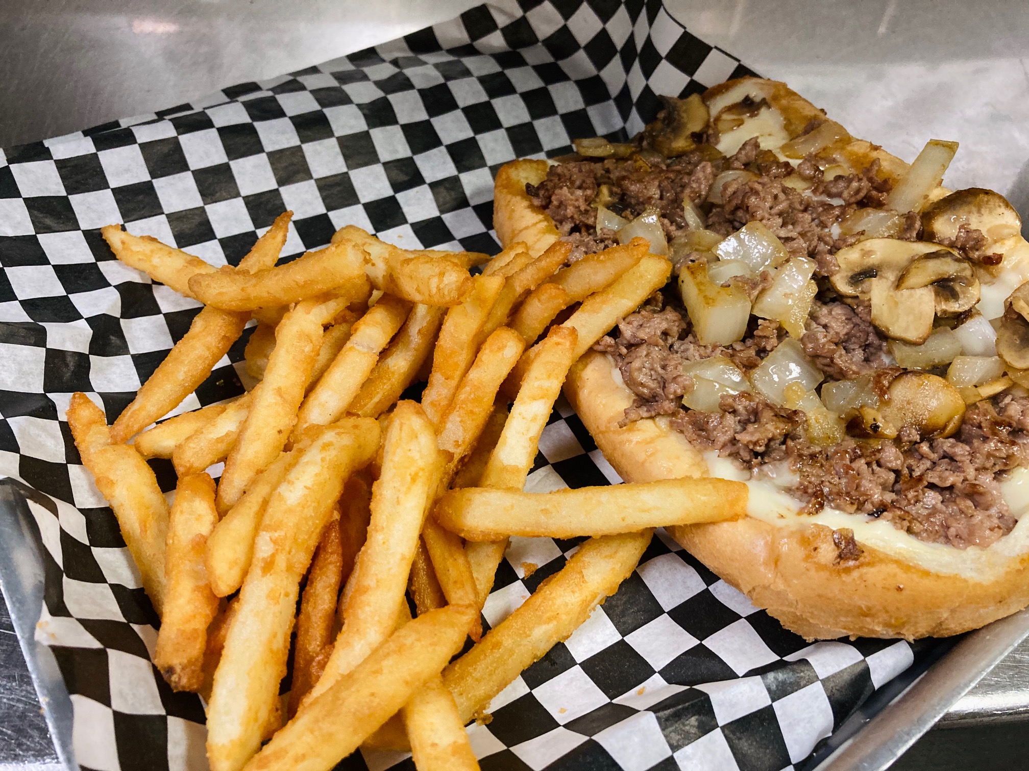 Order Philly Cheesesteak Sandwich food online from Saints Pub + Patio store, Independence on bringmethat.com