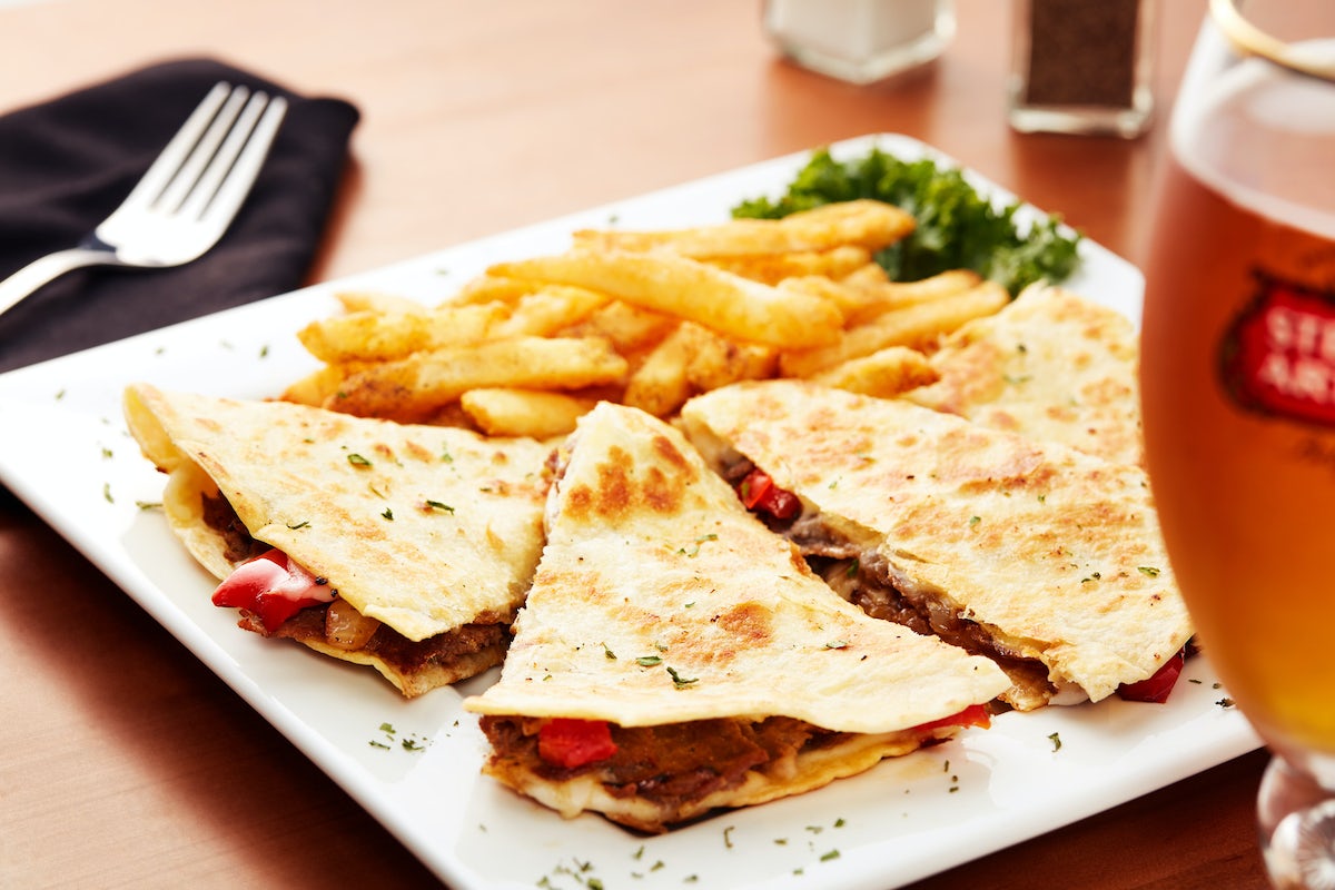 Order PHILLY CHEESE STEAK QUESADILLA food online from Big Whiskey's American Restaurant & Bar store, Springfield on bringmethat.com