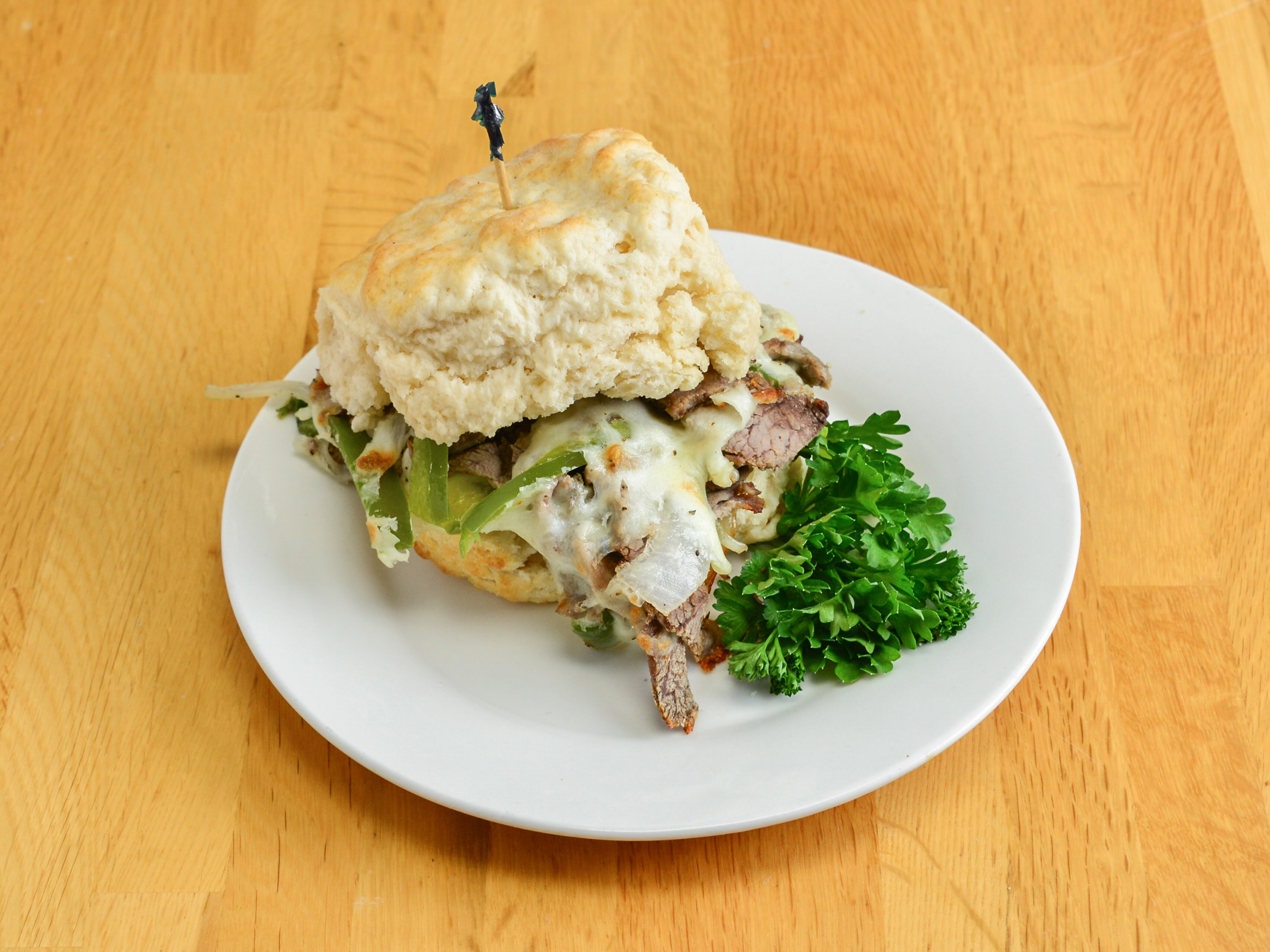 Order Philly Steak Biscuit food online from Grumpy Gary Grill store, Huntington on bringmethat.com