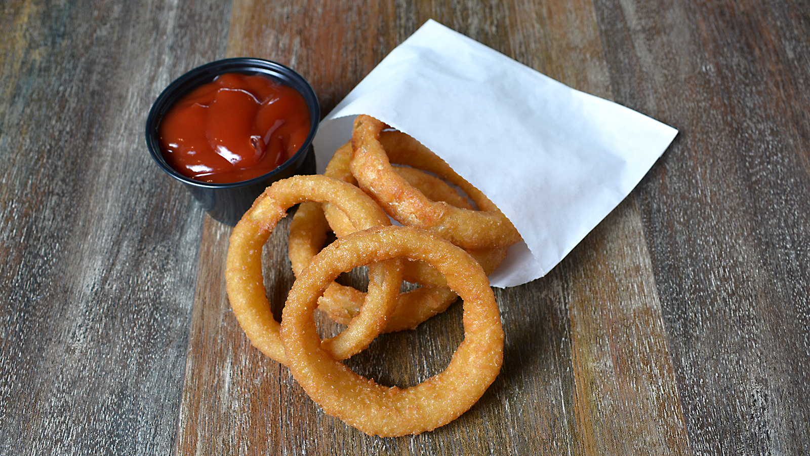 Order Onion Rings food online from Boxcar Burgers store, Ronkonkoma on bringmethat.com