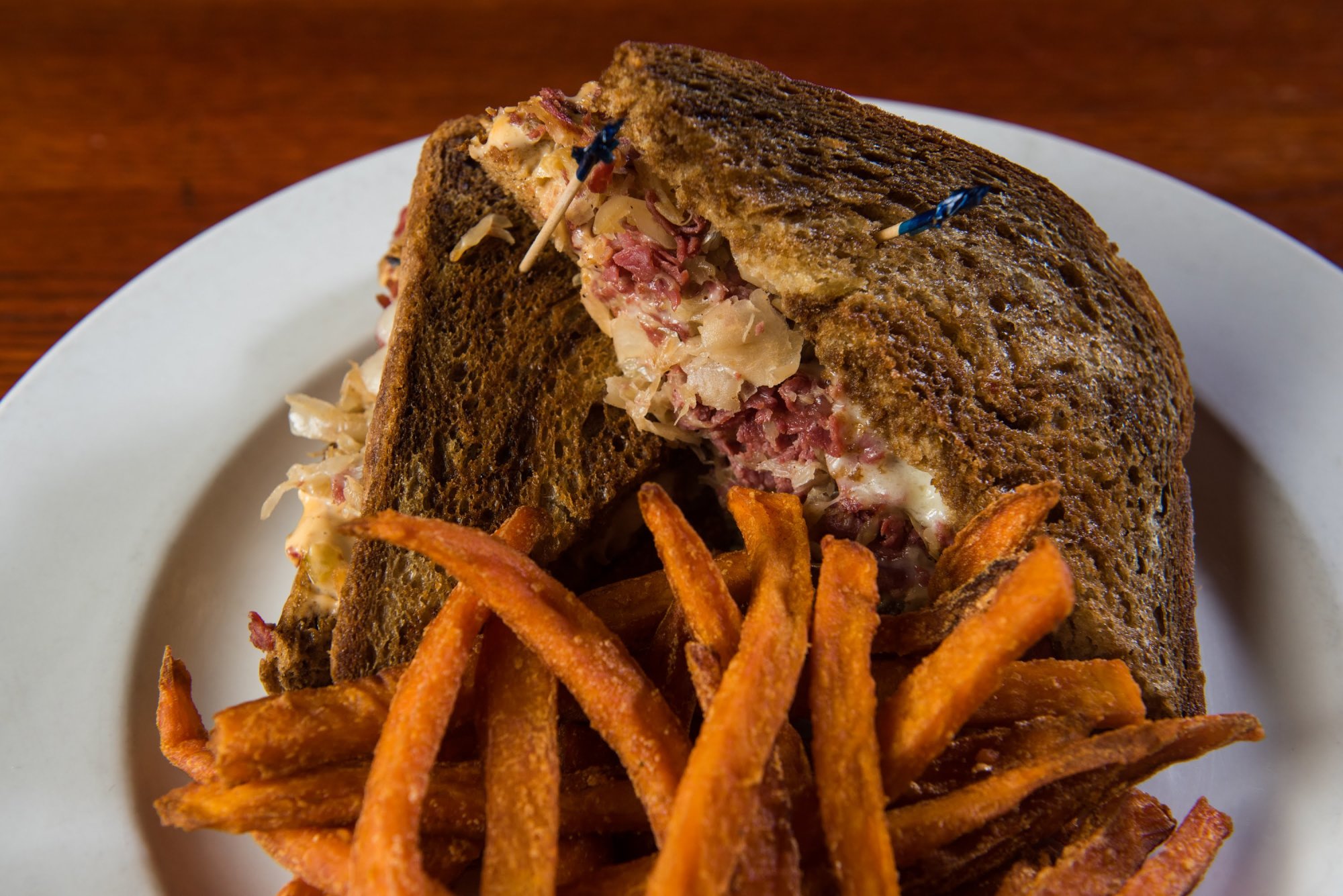 Order Reuben Sandwich food online from The Vine Tavern & Eatery store, Tempe on bringmethat.com