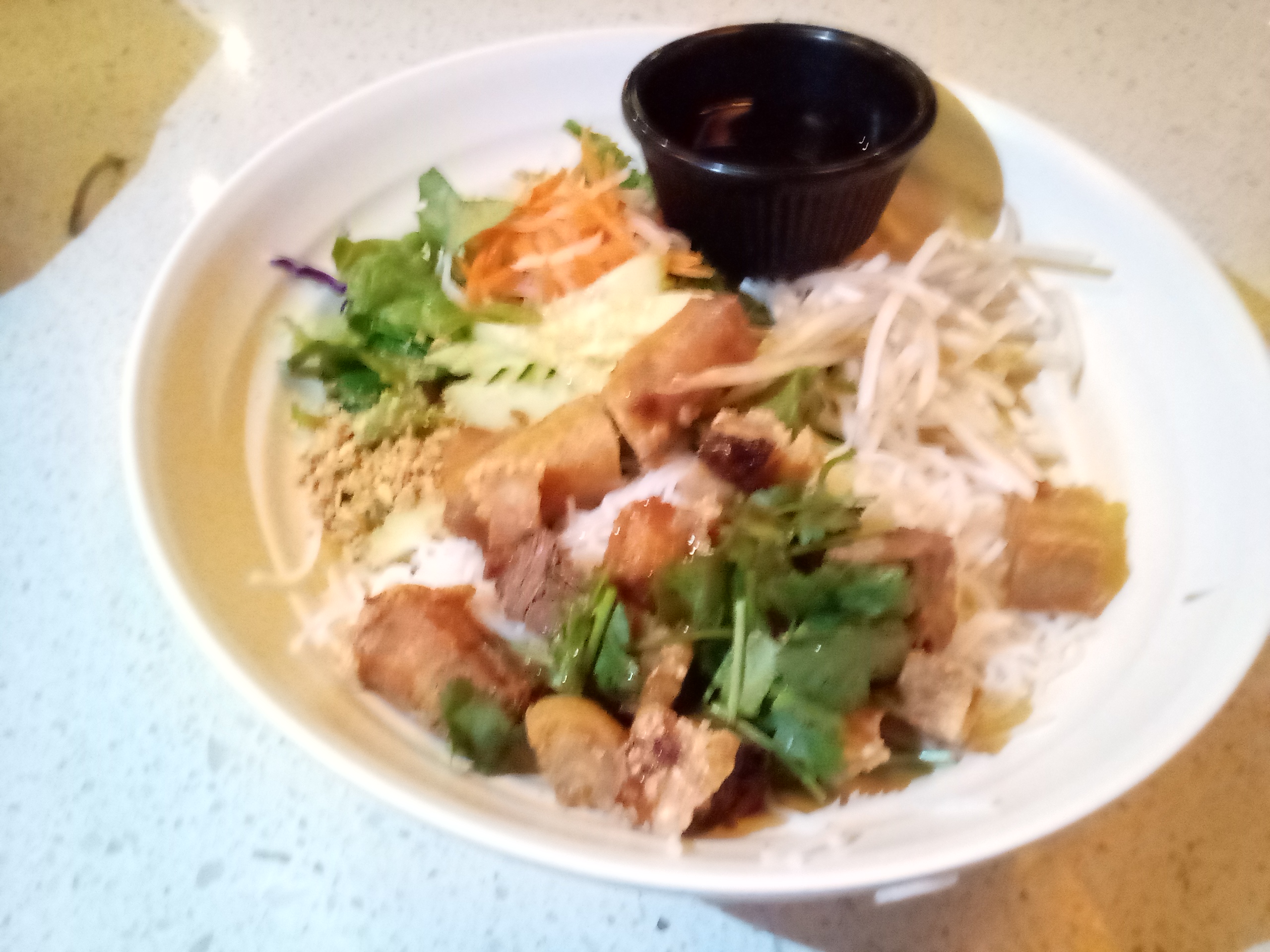 Order Crispy pork Noodle salad  food online from Phovorite Vietnamese Kitchen store, Culver City on bringmethat.com