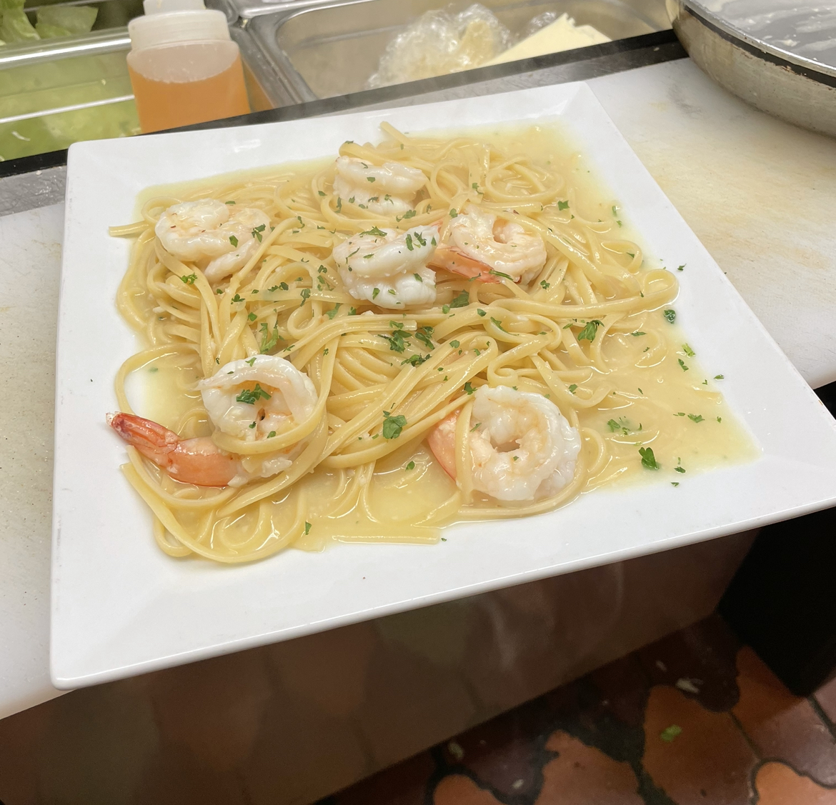 Order Shrimp Scampi Over Linguini food online from Dino Italian Restaurant store, Wilkes-Barre on bringmethat.com