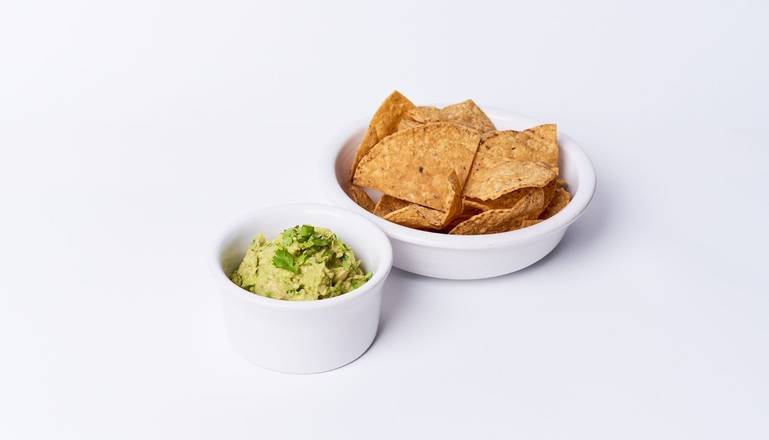 Order GUAC AND CHIPS food online from Cafe Gratitude store, San Diego on bringmethat.com