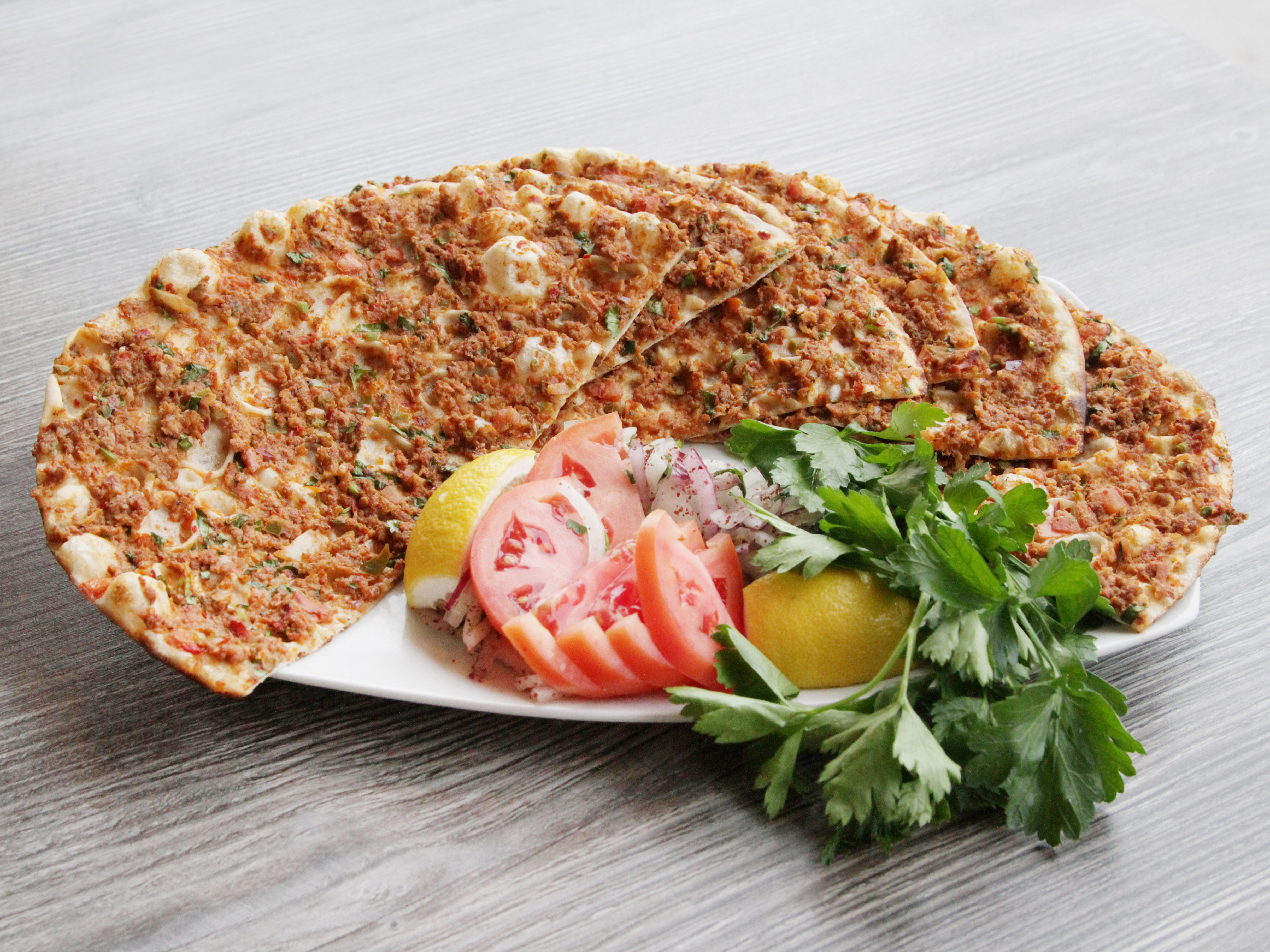 Order Lahmajoun (2 Large Pieces) food online from Pita Gyro Grill store, Ridgewood on bringmethat.com