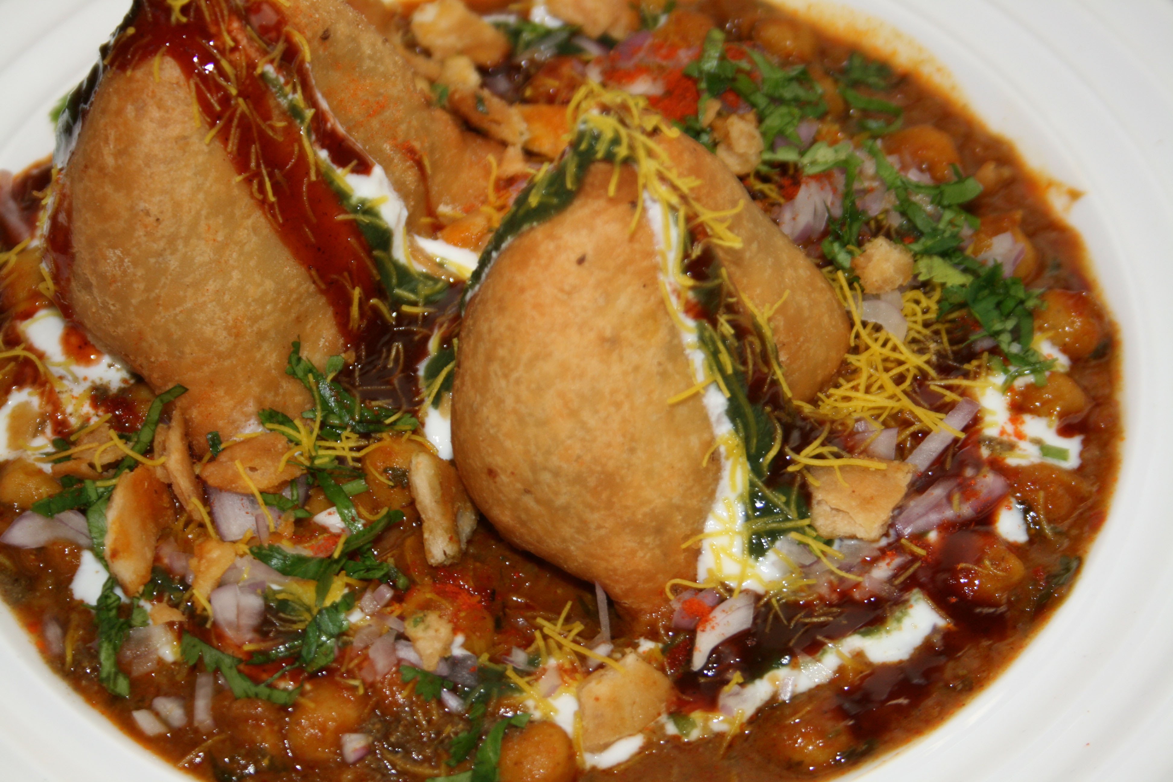 Order Samosa Chaat food online from India's Grill store, Los Angeles on bringmethat.com