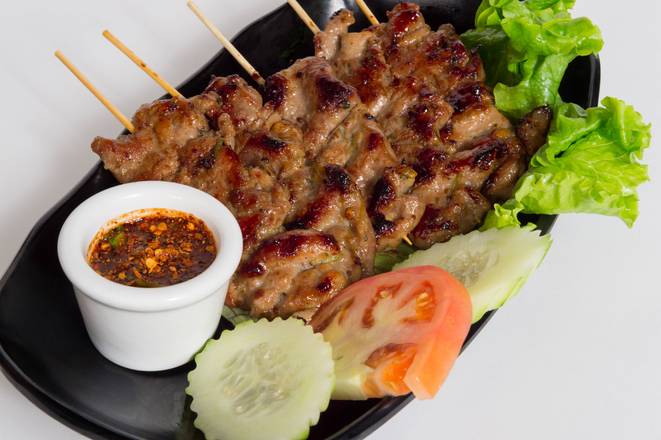 Order SS1. Grilled Pork (Moo Ping) food online from Thai Street Eats store, Oklahoma City on bringmethat.com