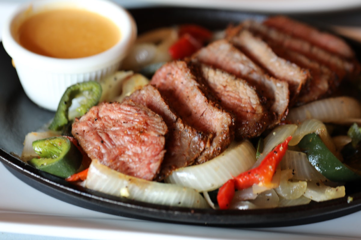 Order Filet Mignon Fajitas For One food online from Uncle Julio's store, Durham on bringmethat.com