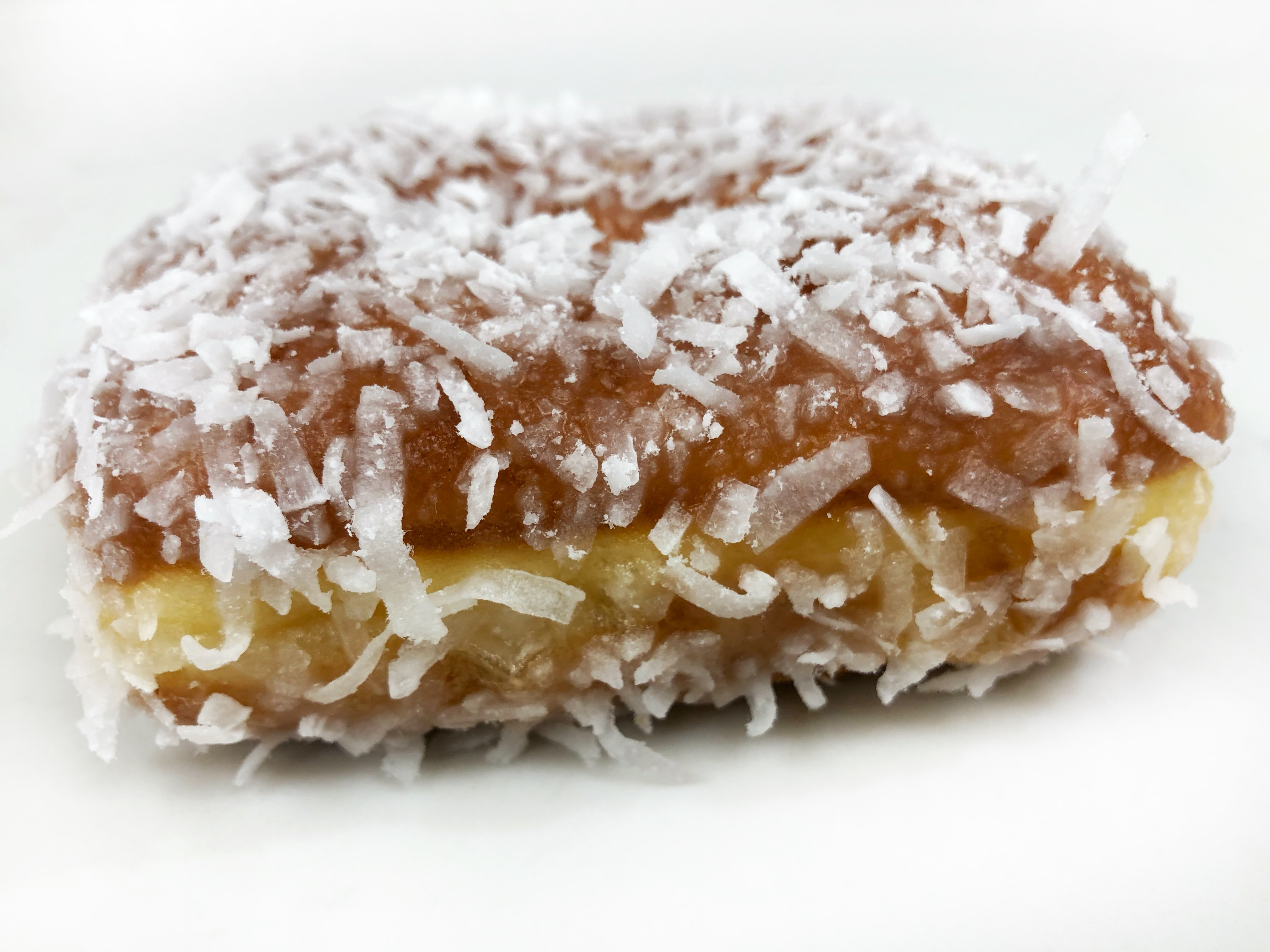 Order Coconut Raised Donut food online from The Donuttery store, Huntington Beach on bringmethat.com