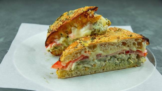 Order Chicken Pesto Melt food online from Patxi's Pizza store, Seattle on bringmethat.com