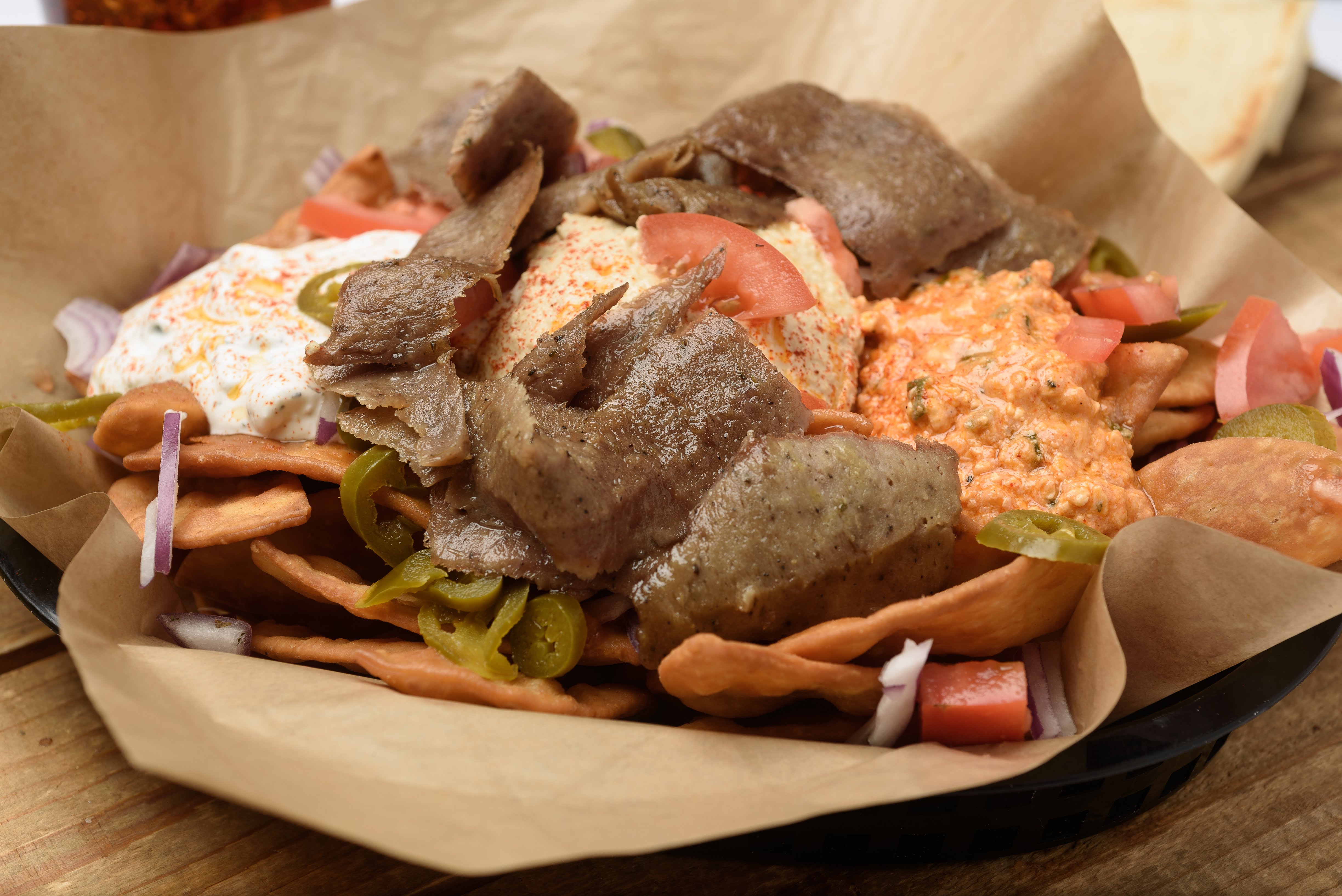 Order Greek Nachos with Beef food online from Zorbas store, Youngsville on bringmethat.com