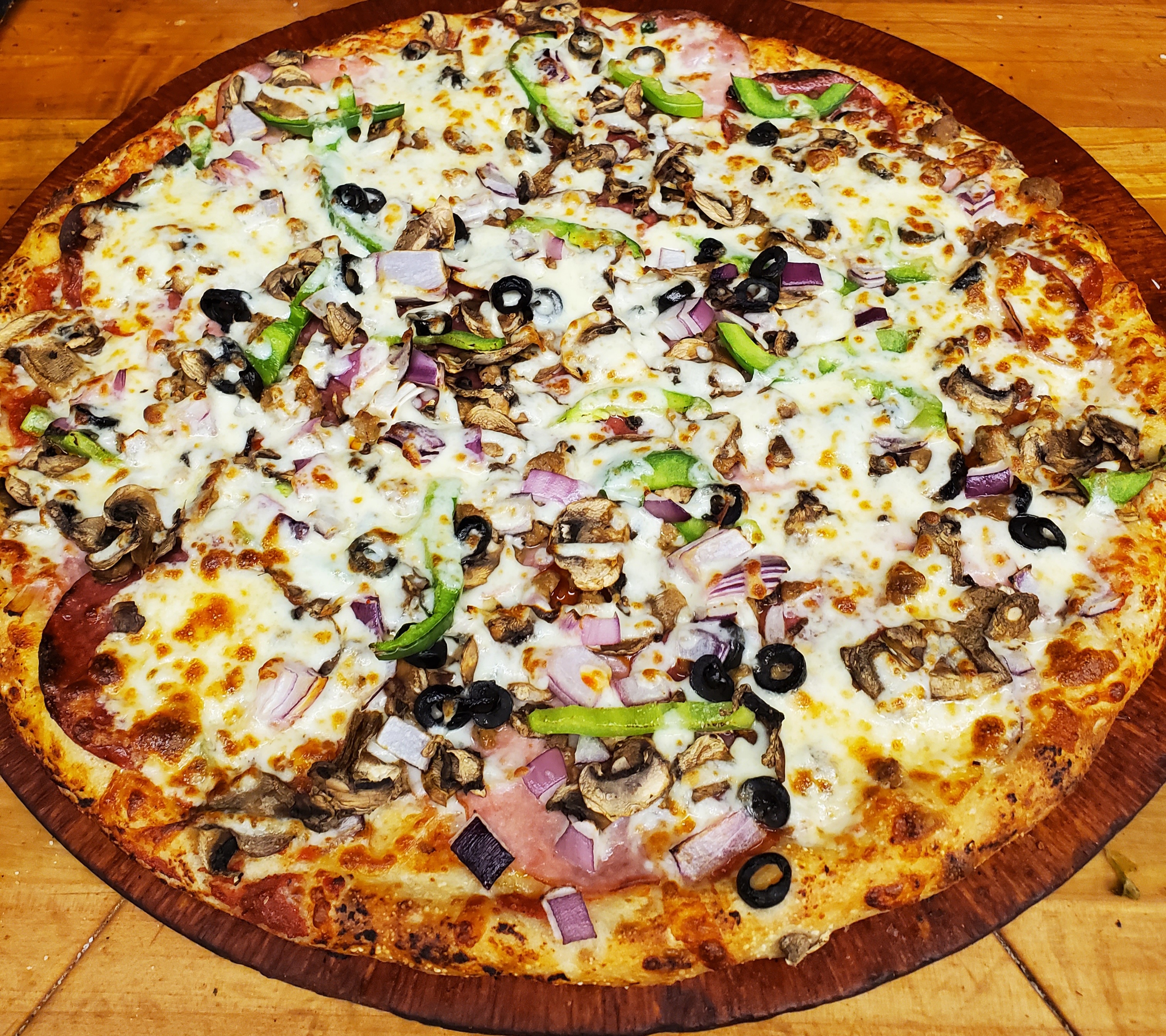 Order Extreme Combo Pizza food online from Bella Pizza & Pasta store, Bothell on bringmethat.com