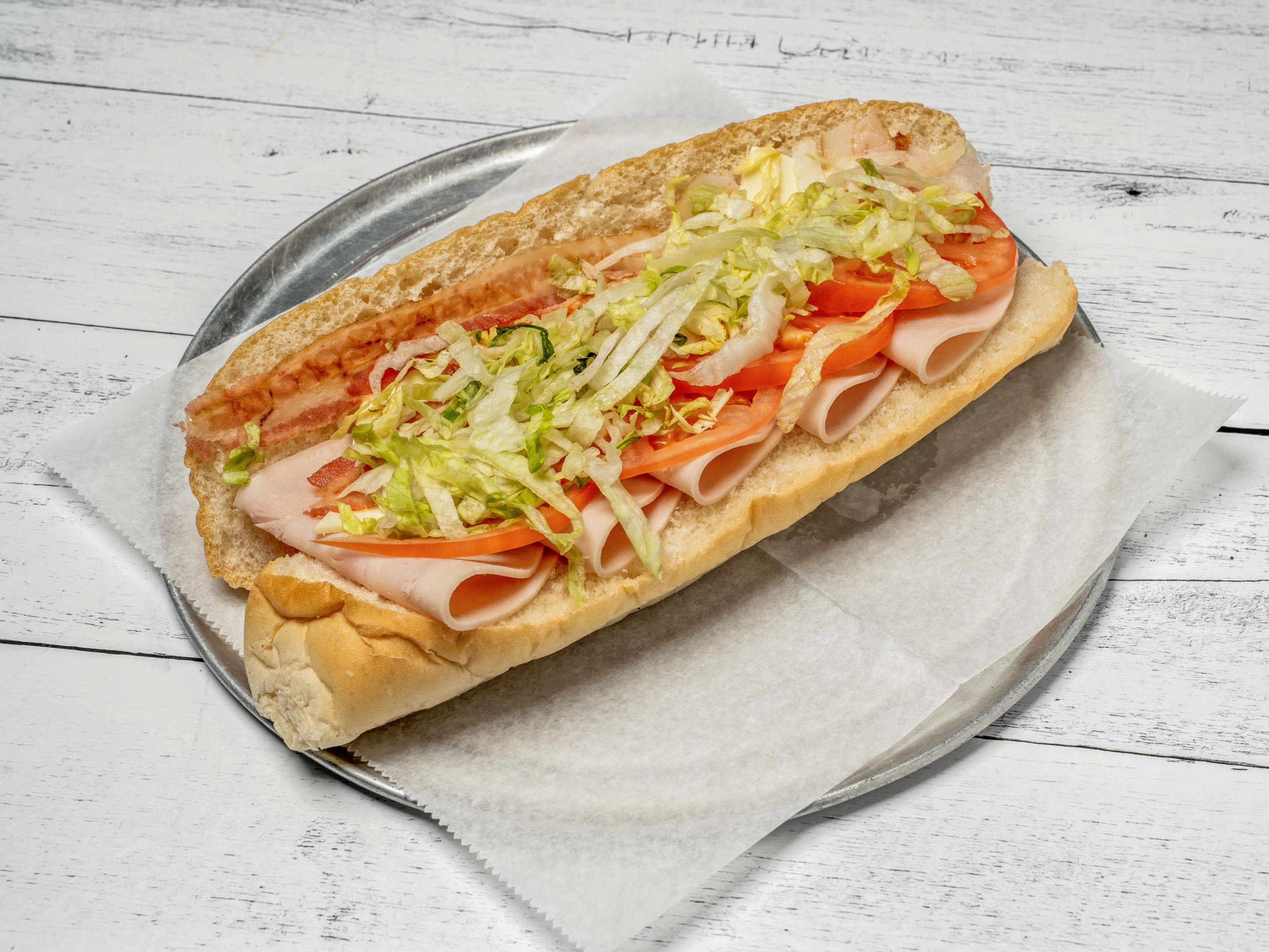 Order Turkey and Bacon Club Sub  food online from Nb Pizza Spot & More store, New Bedford on bringmethat.com
