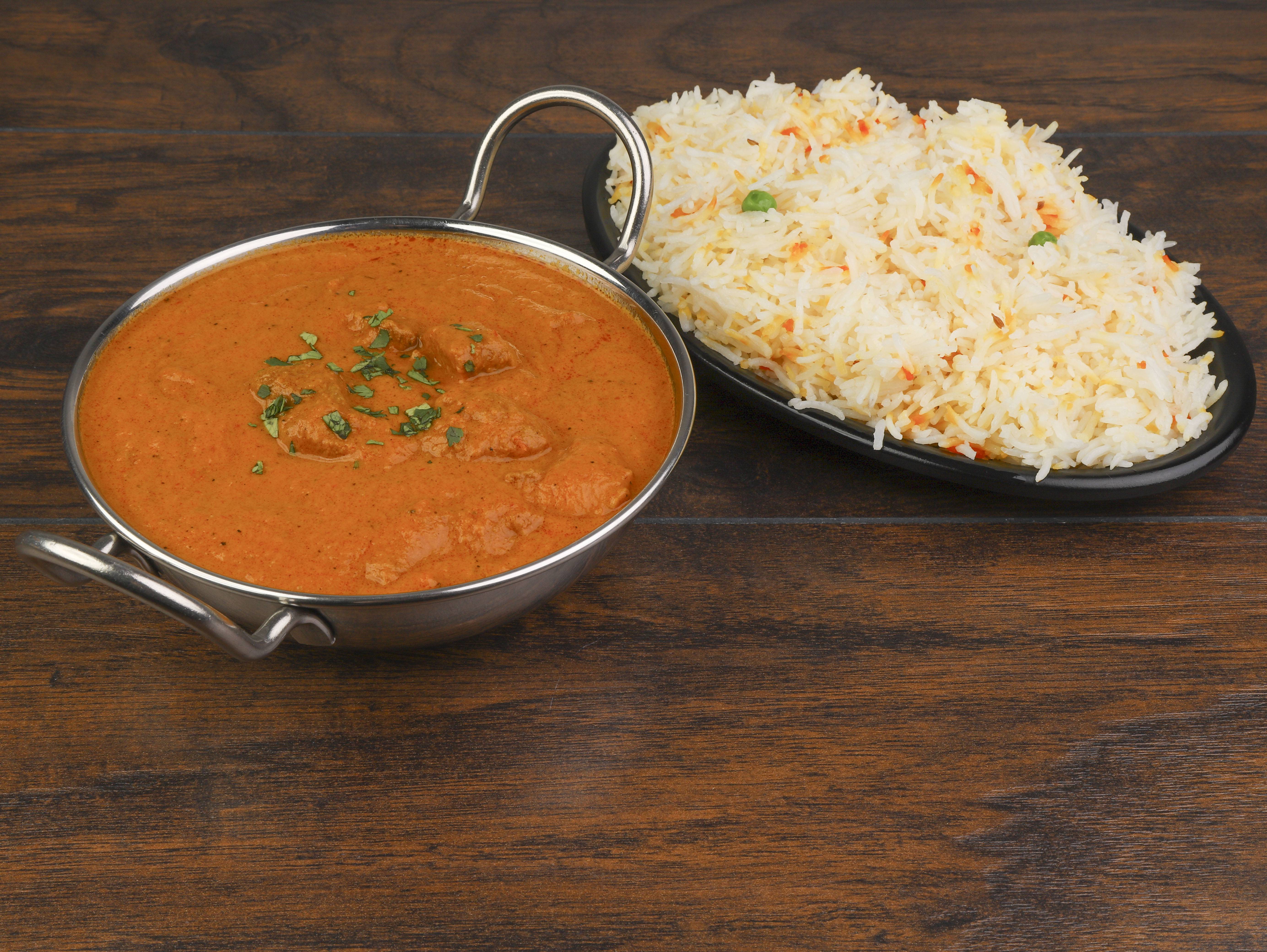 Order 9. Chicken Makhani food online from Amol India Carryout Restaurant store, Newport on bringmethat.com