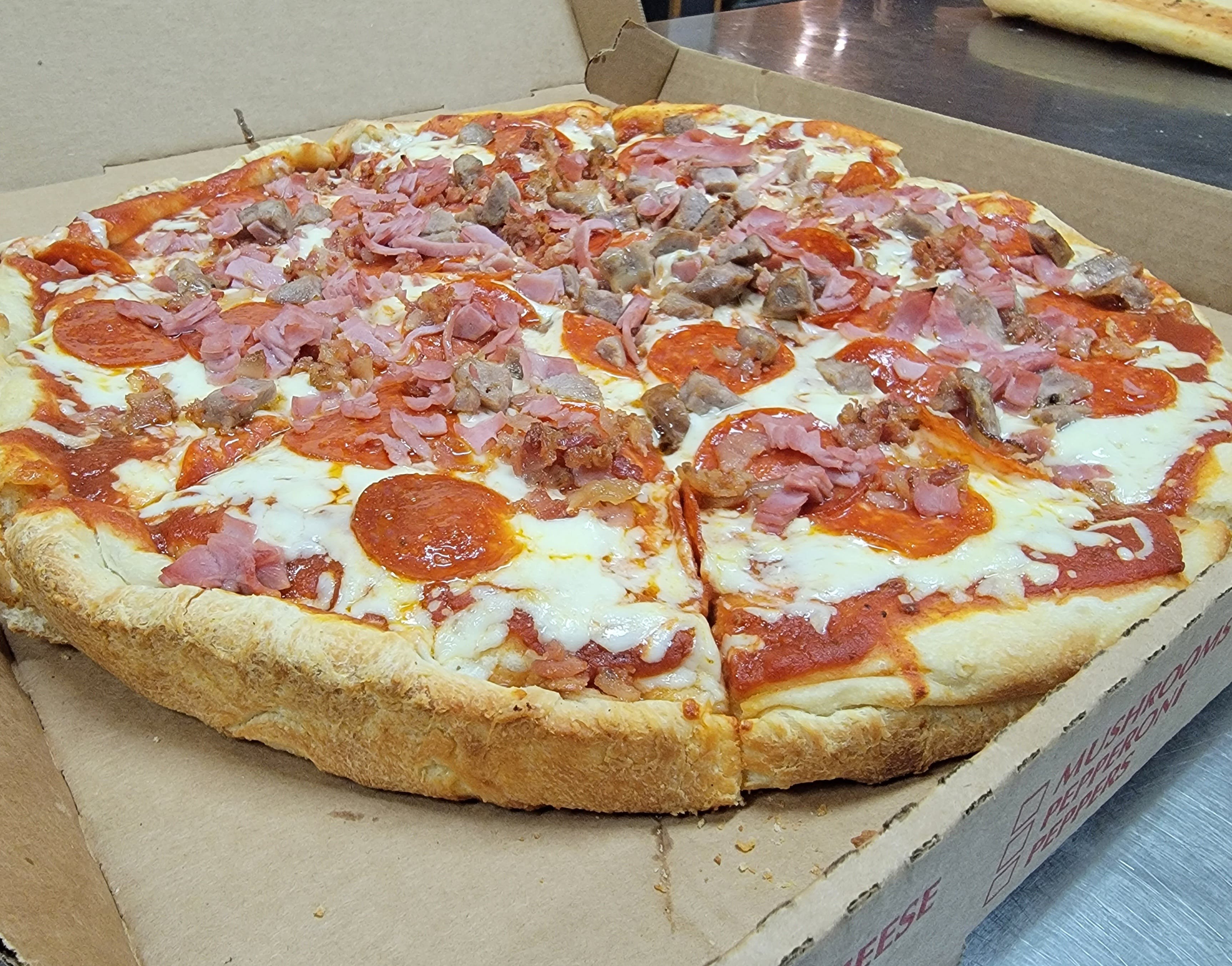 Order Meatlovers Pan Pizza - Pizza food online from Tony Pizza store, Highspire on bringmethat.com