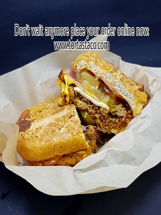 Order Torta Barbacoa/Shredded Beef food online from El Carreton Mexican Taqueria store, Gainesville on bringmethat.com