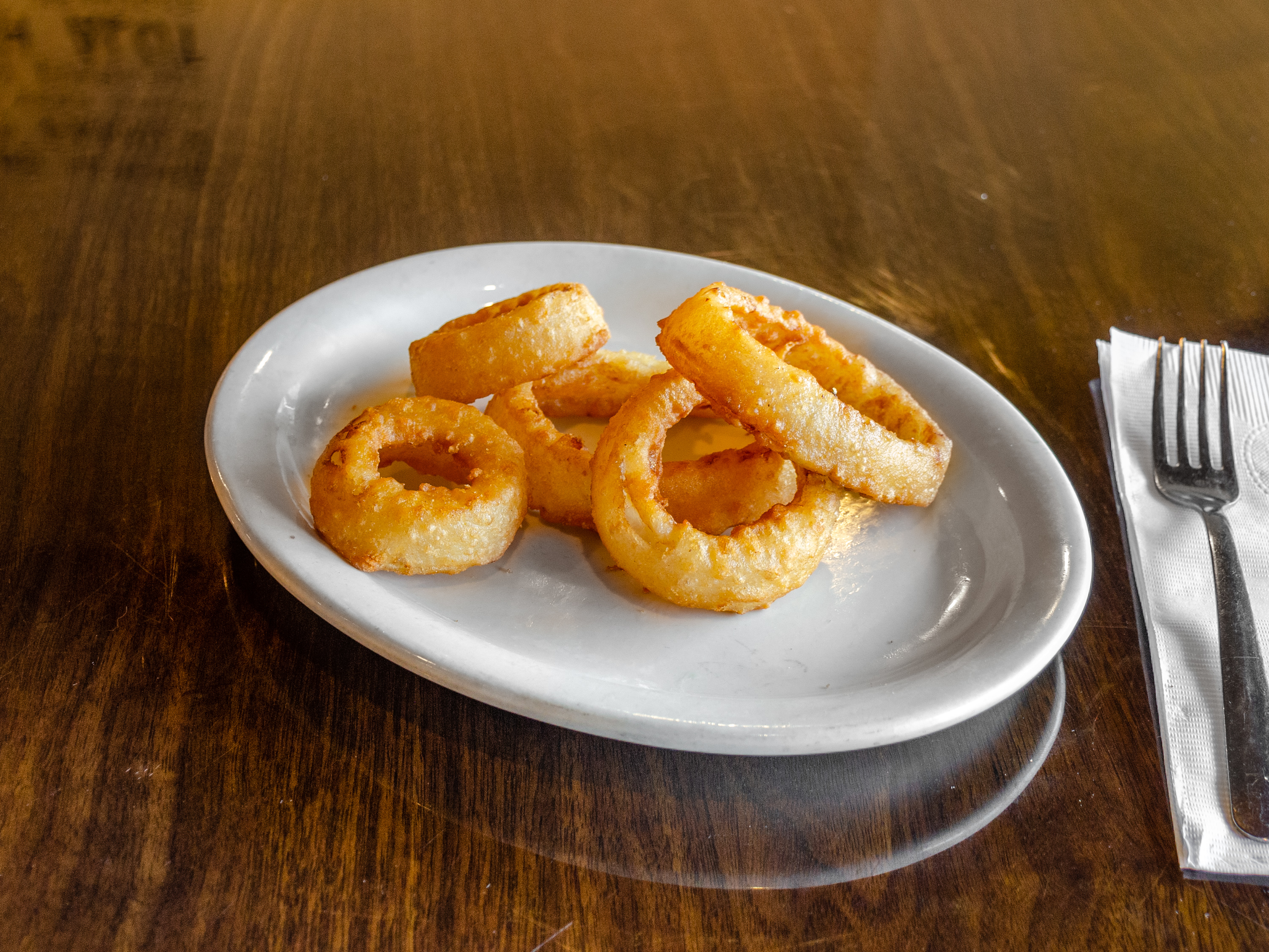 Order 6 oz. Onion Rings food online from Parkway Express Pizza, Subs, & More store, Lafayette on bringmethat.com