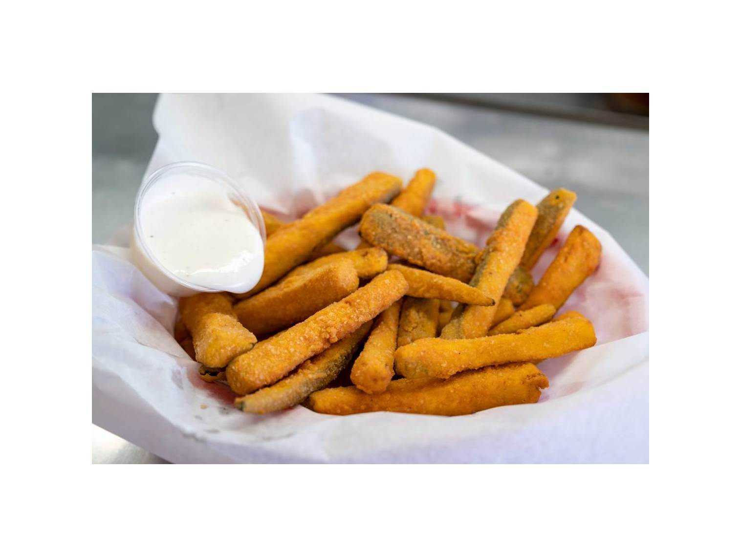 Order Breaded Zucchini Sticks food online from Norm Famous Burgers store, Whittier on bringmethat.com