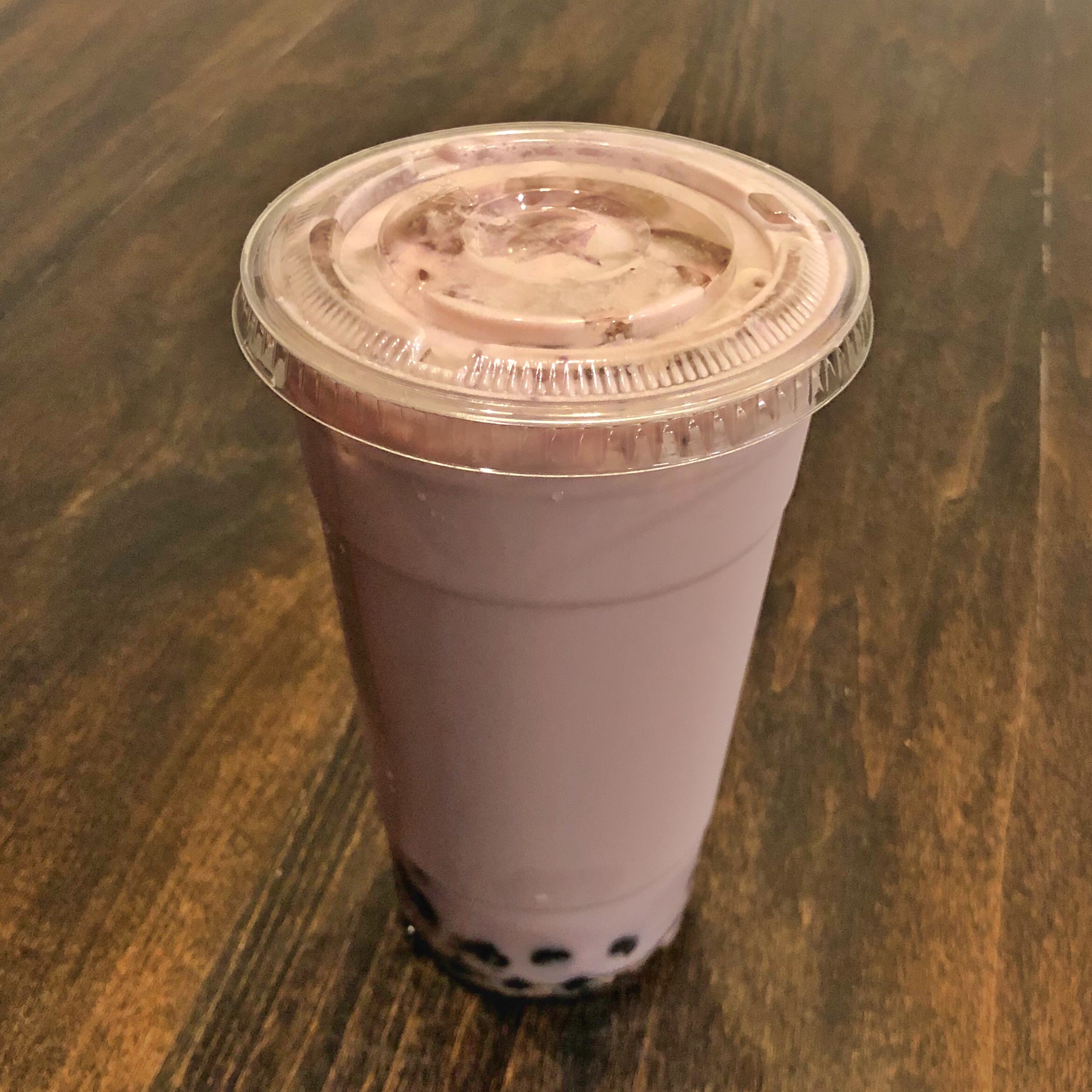 Order Taro Milk Tea food online from Isshin Ramen & Boba store, Los Angeles on bringmethat.com